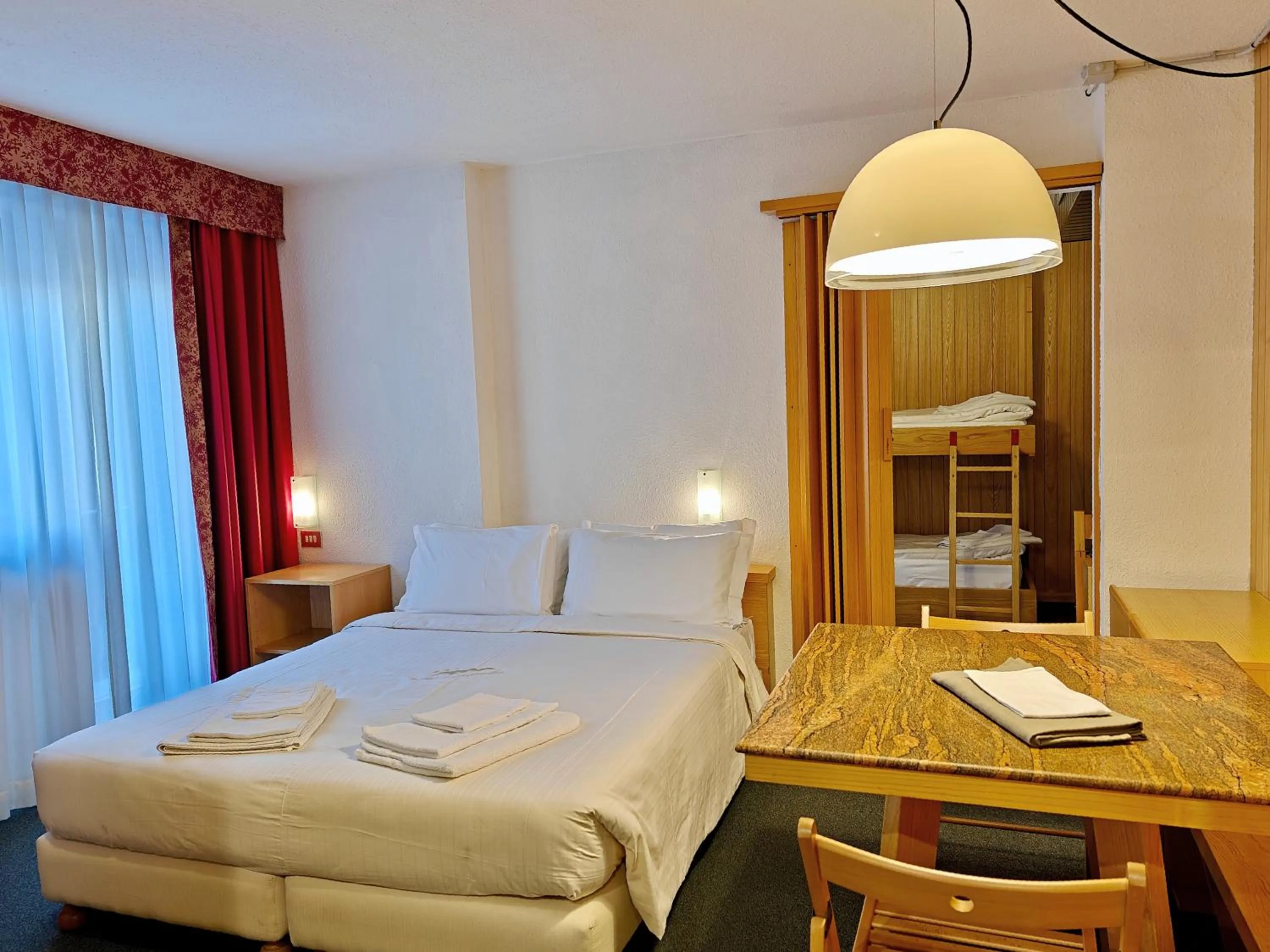 Living room, Bed in Residence Les Coupoles