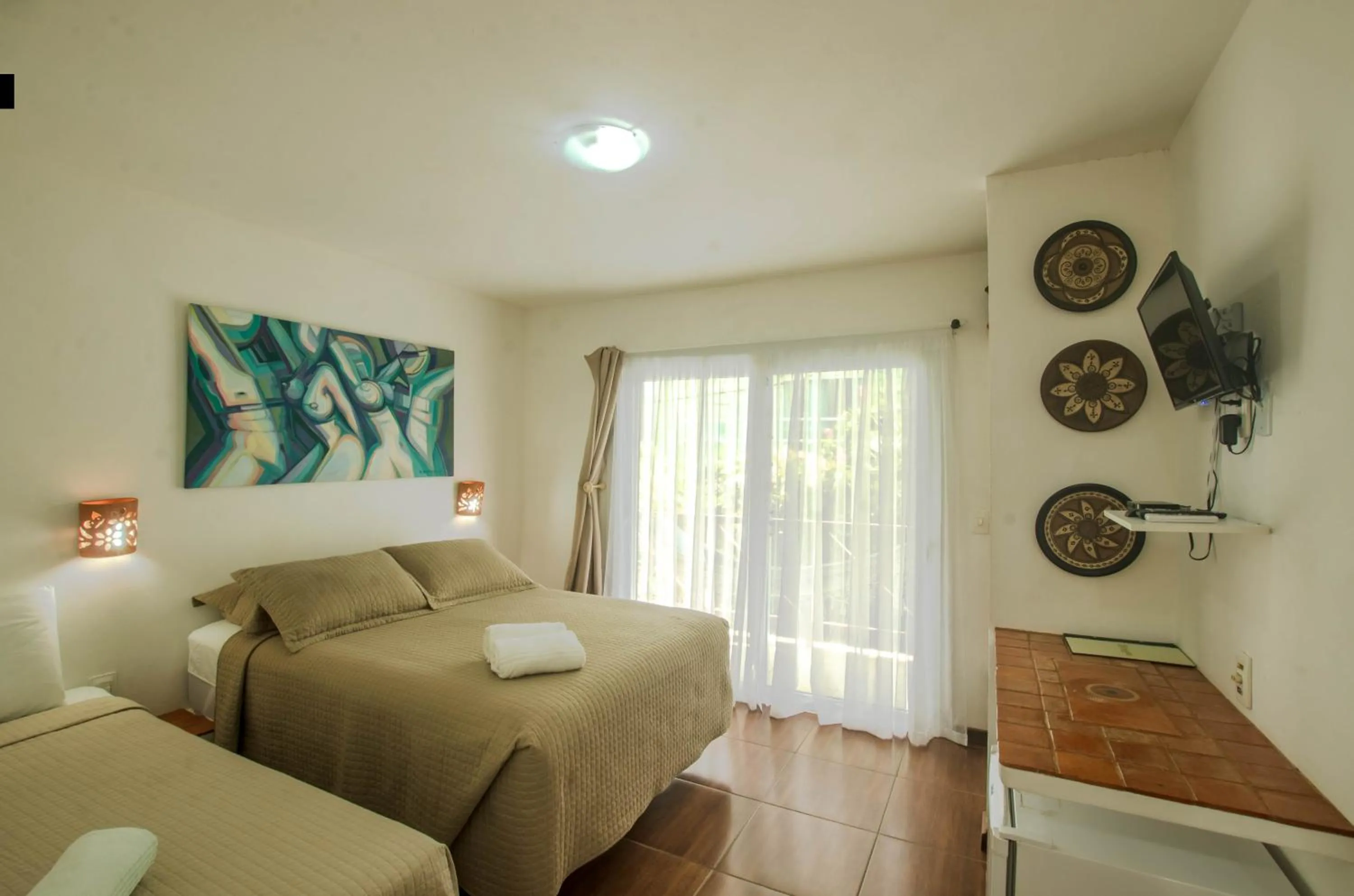 Photo of the whole room, Bed in Pousada Borboleta