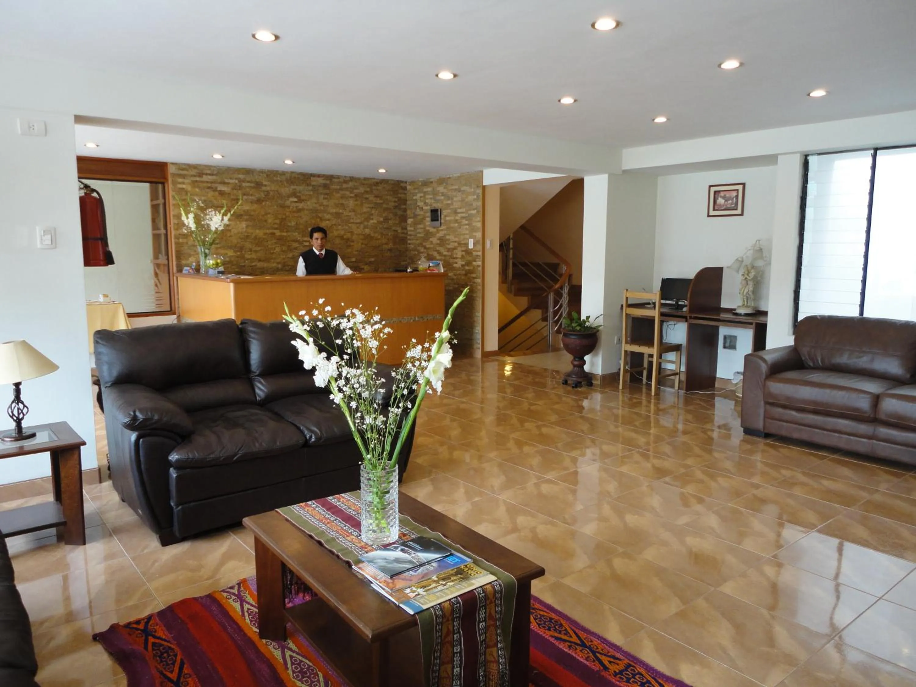 Communal lounge/ TV room in Florida del Inca Hotel