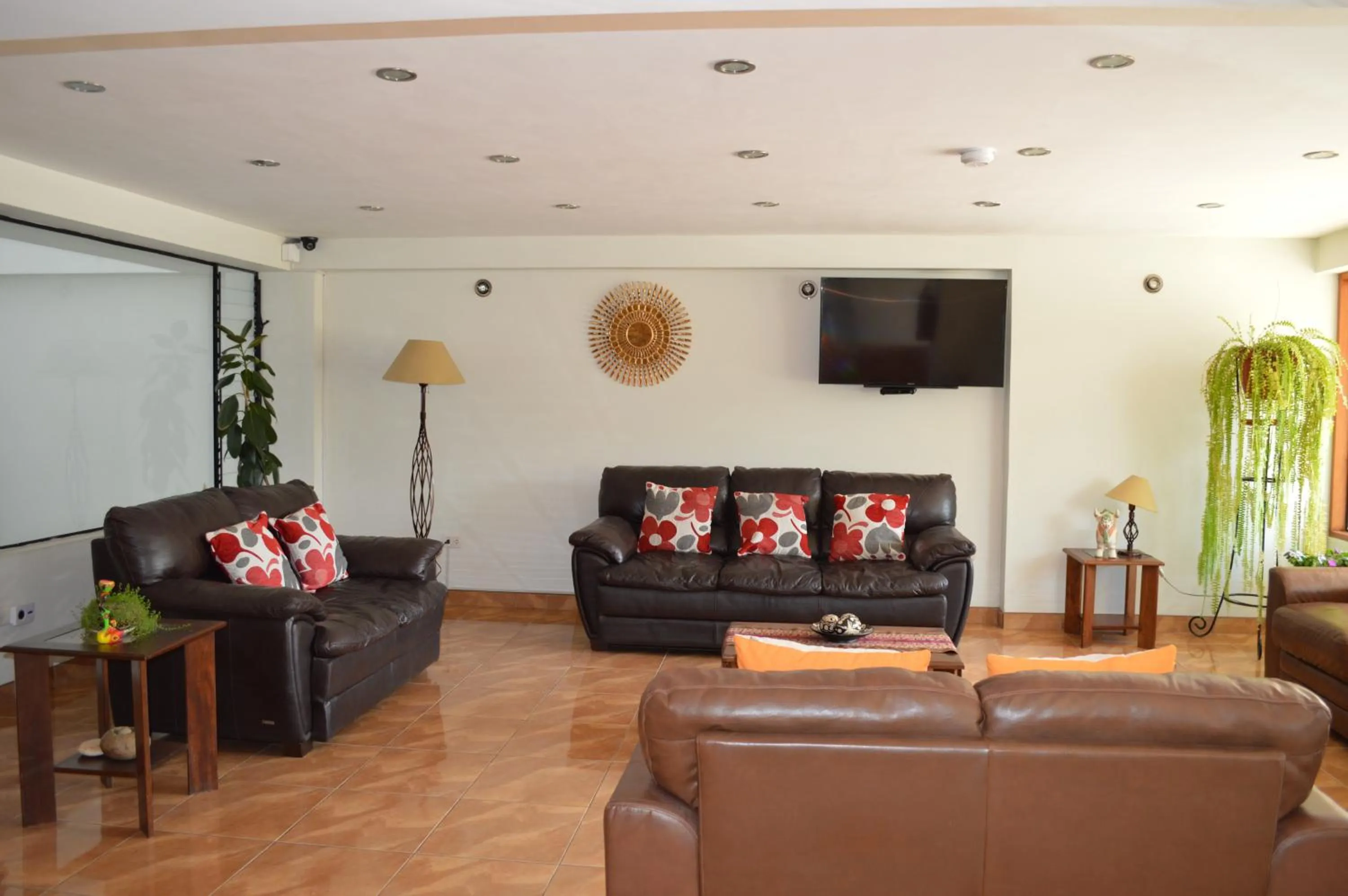 Communal lounge/ TV room in Florida del Inca Hotel