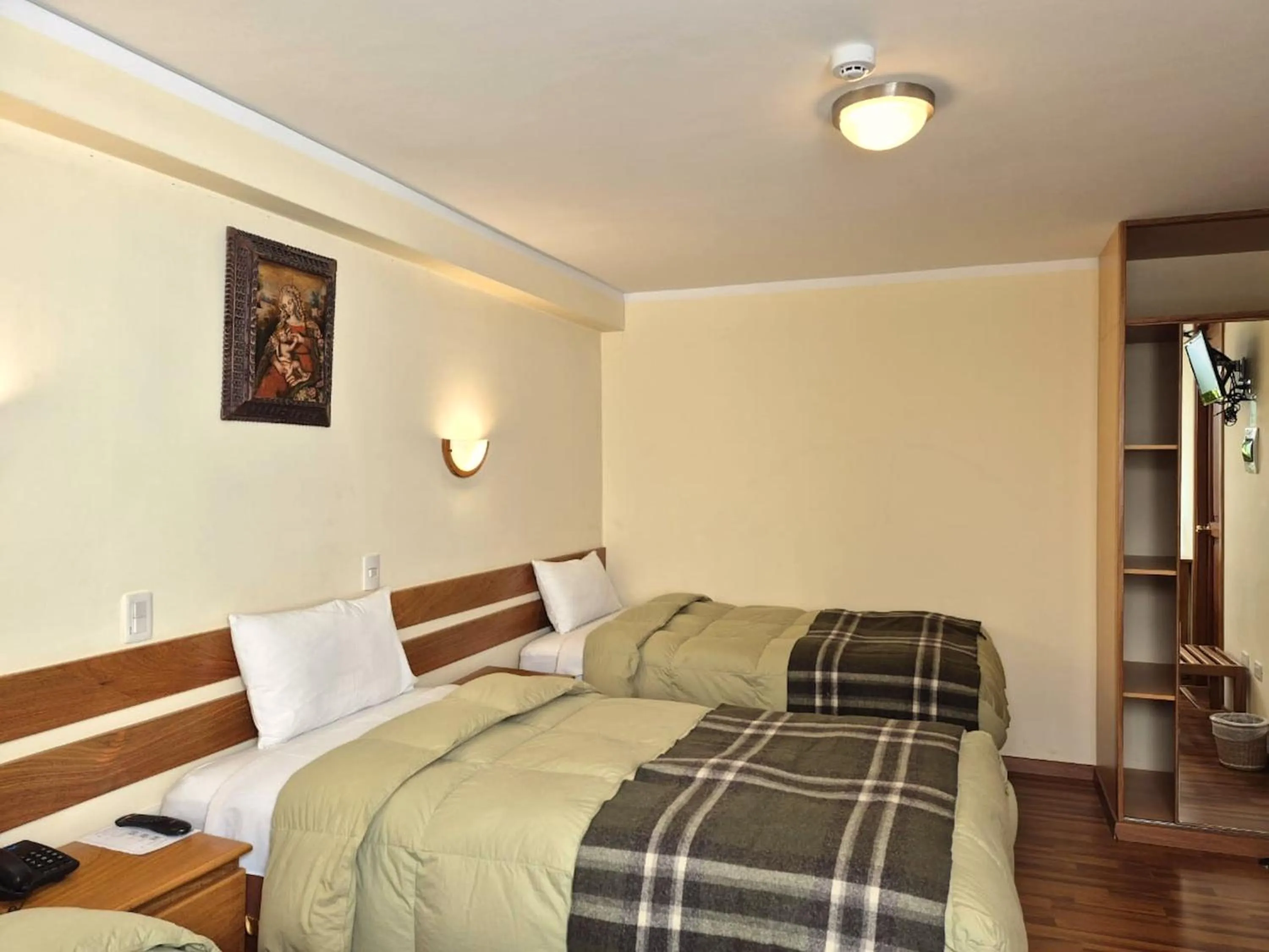 Bed in Florida del Inca Hotel