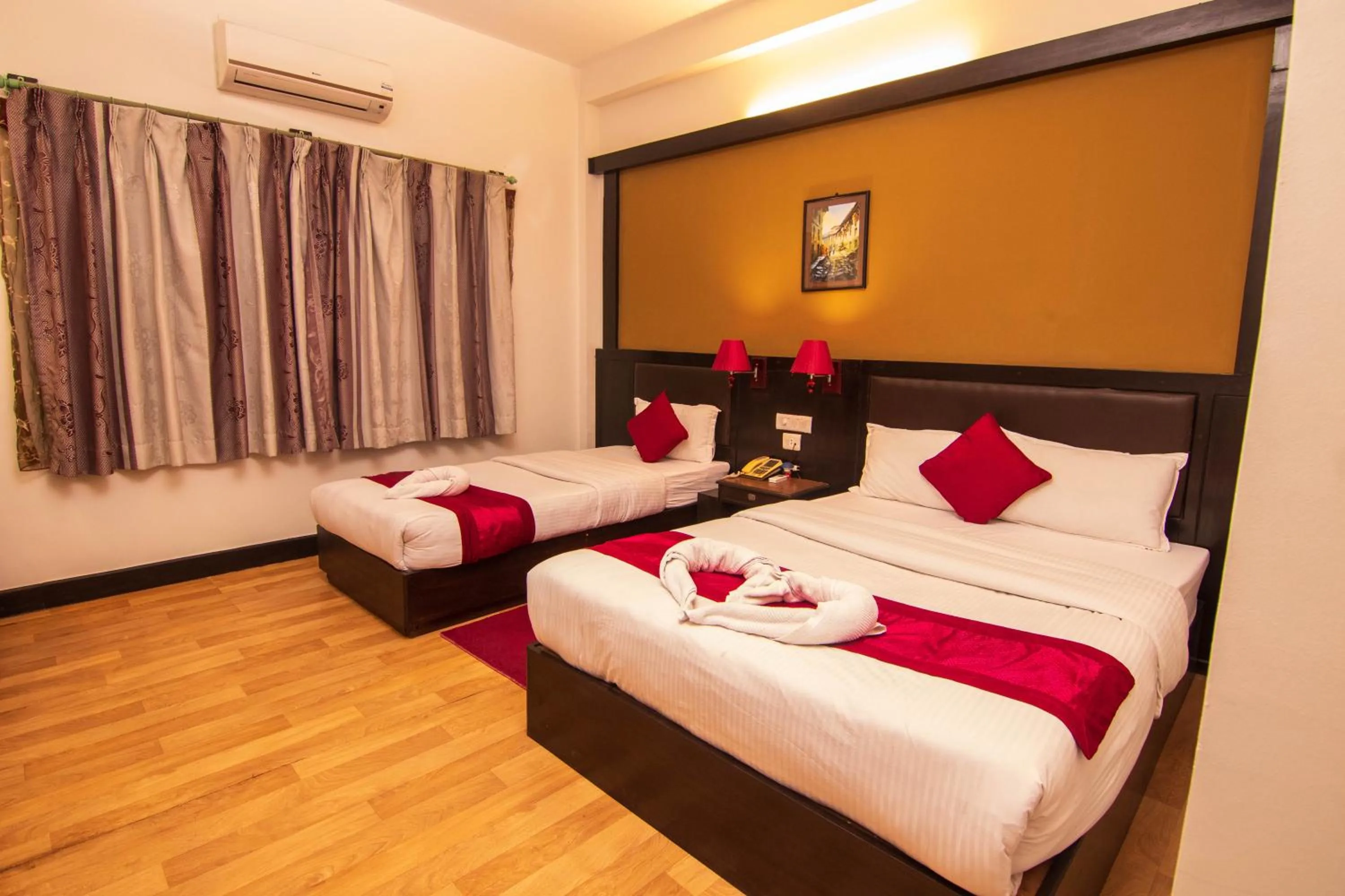 Bed in Hotel Ananda Inn