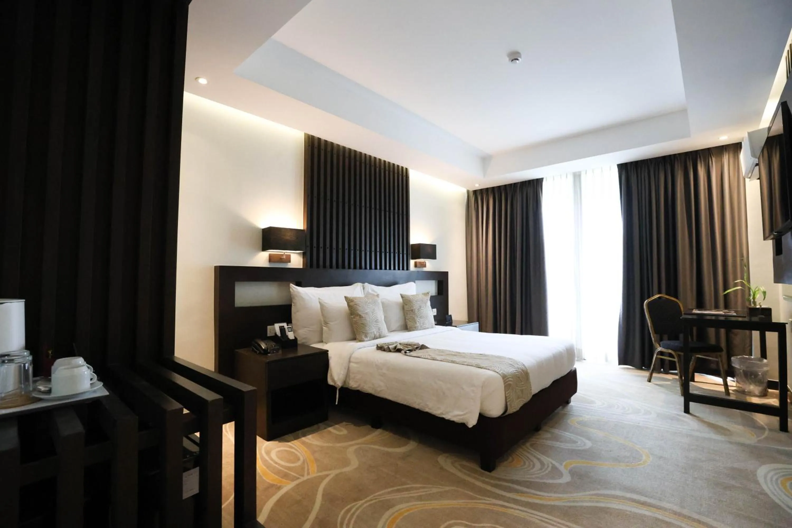 Bed in The Oriental Hotel Legazpi