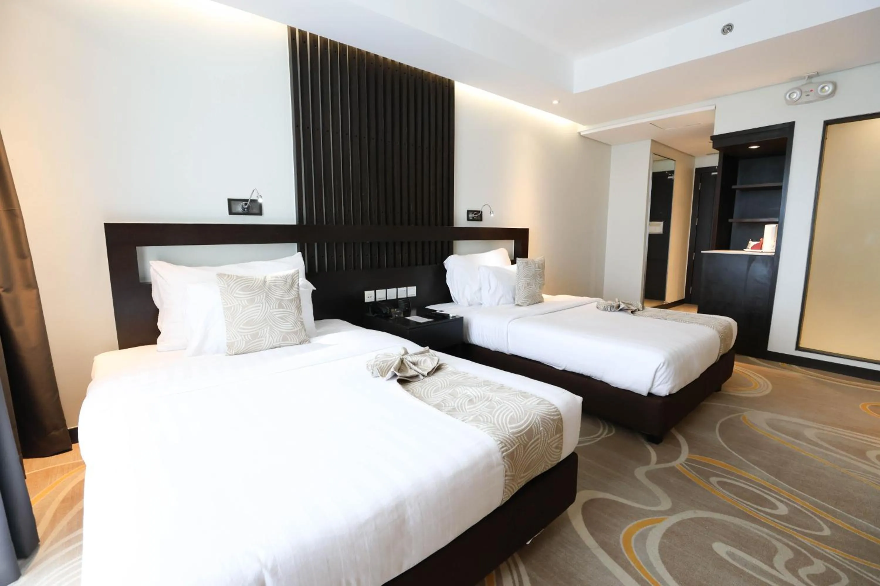 Bed in The Oriental Hotel Legazpi