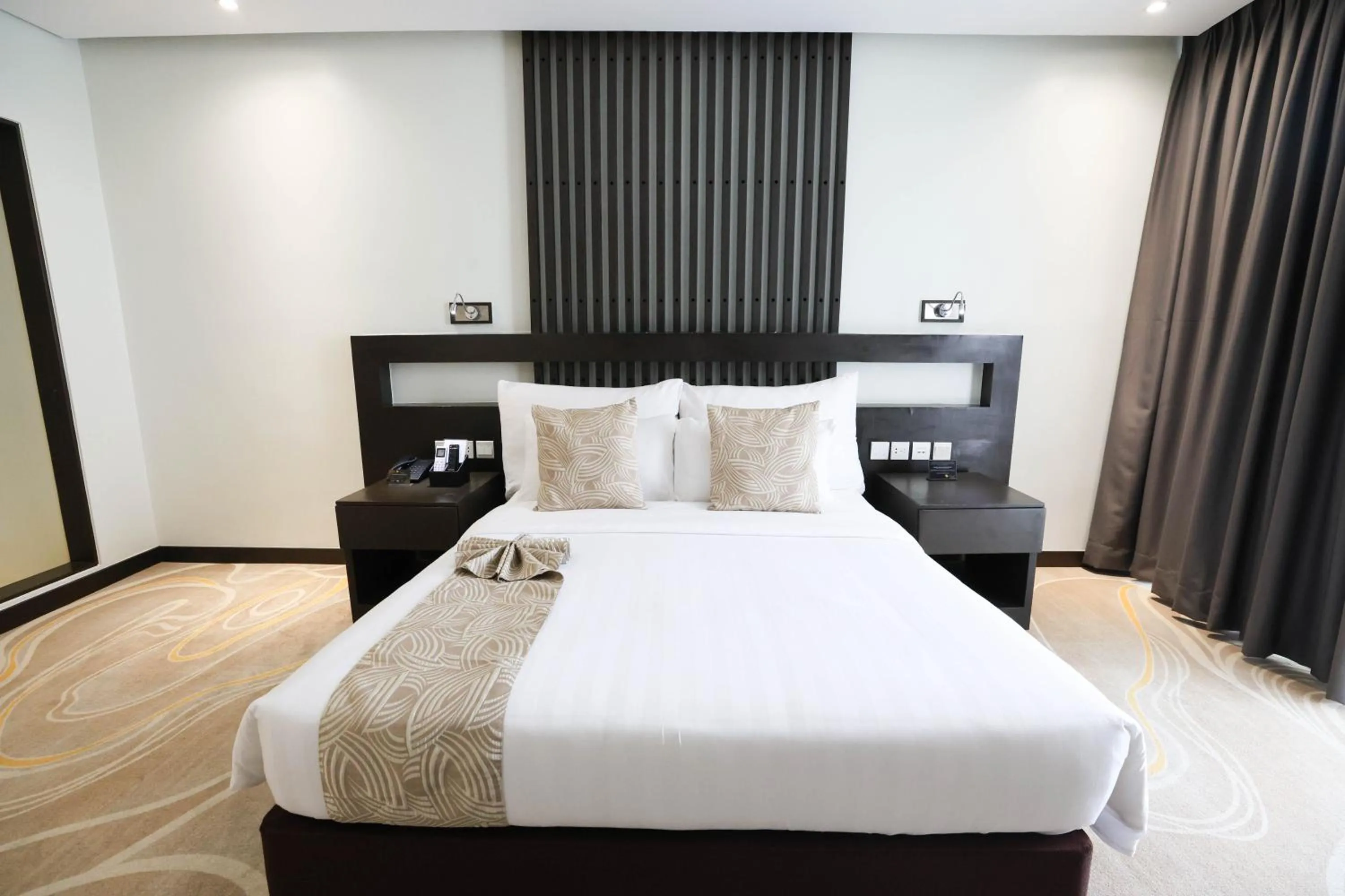 Bed in The Oriental Hotel Legazpi