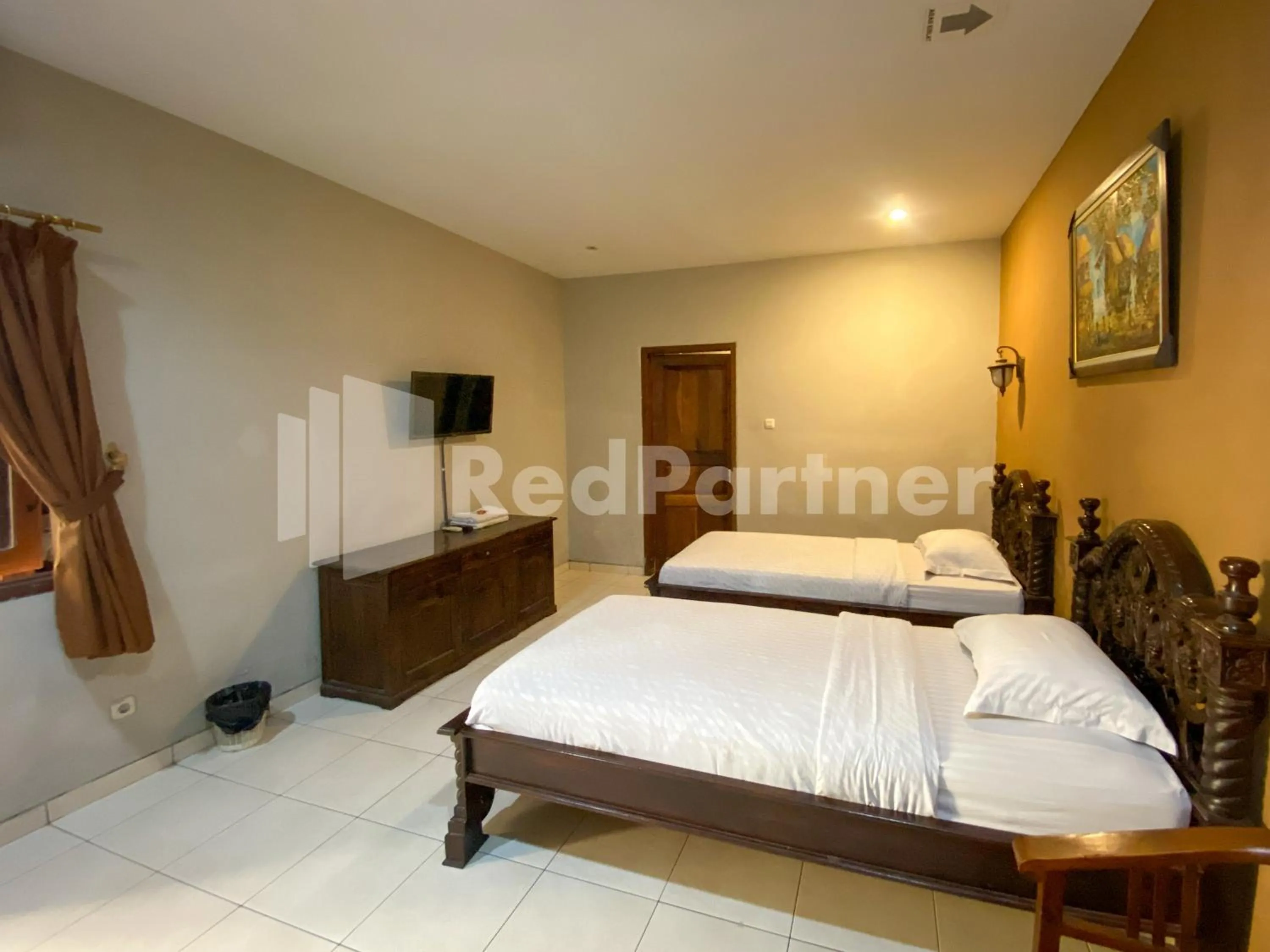 Bed in Istana Griya 2 Hotel Solo RedPartner