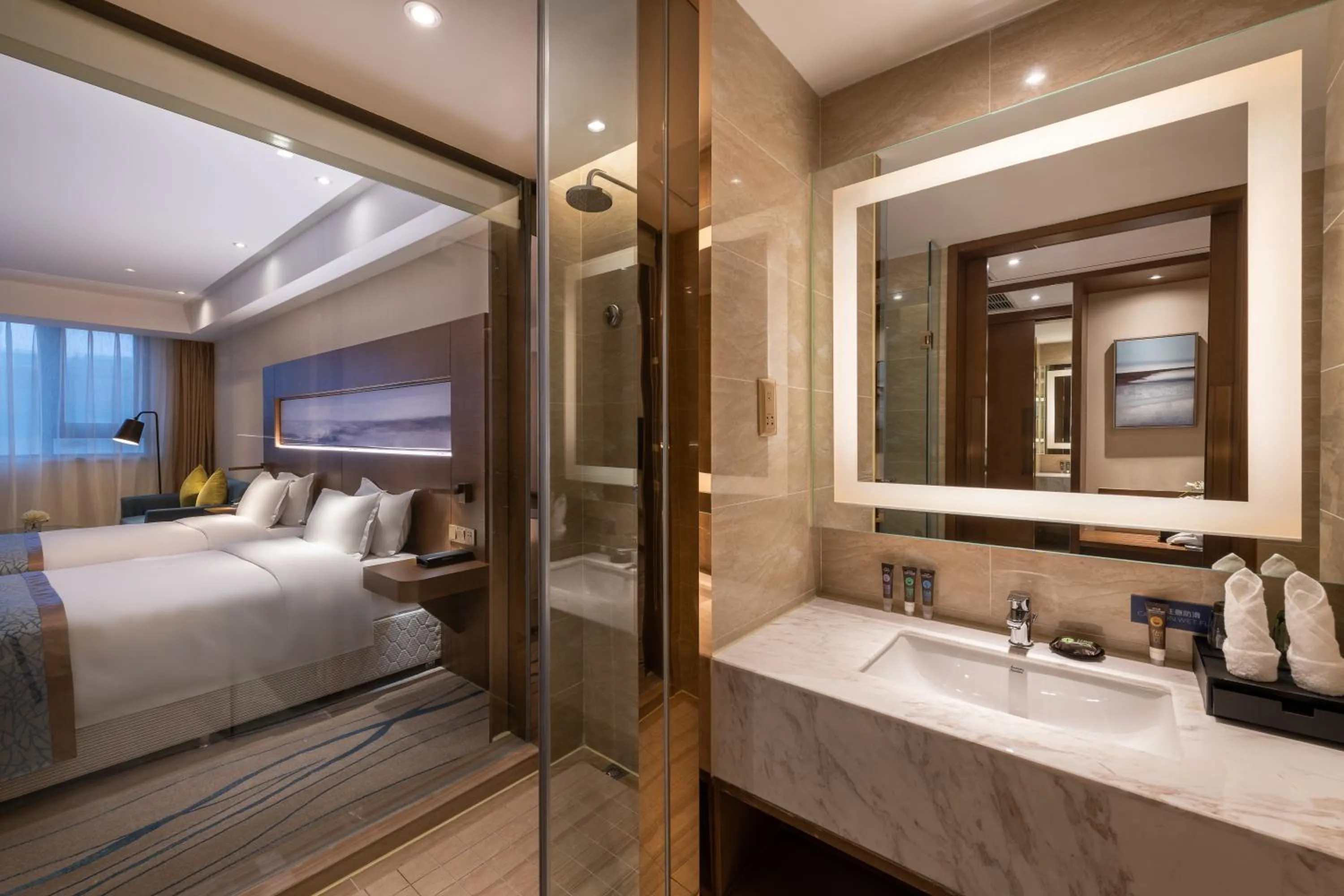 towels, Bed in Novotel Qingdao New Hope