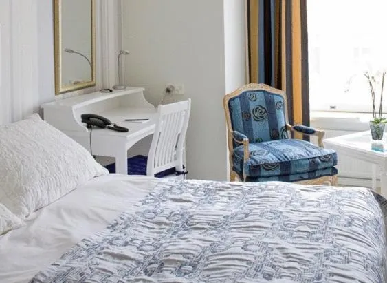 Bed, Seating Area in Hotel Rivoli Jardin