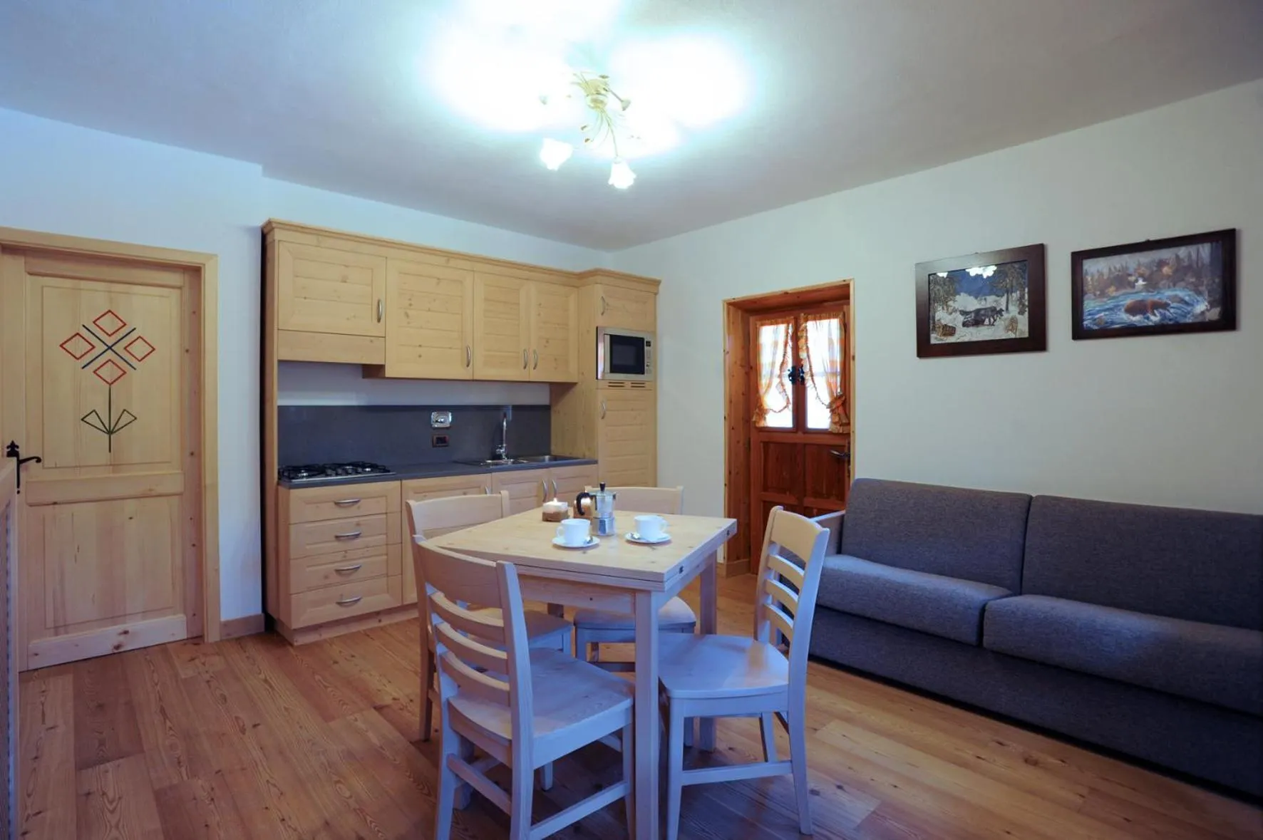 Kitchen or kitchenette in Albergo Diffuso Comeglians