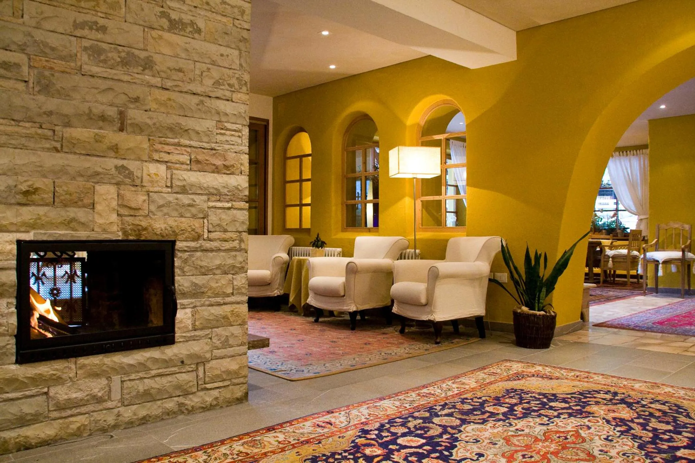 Communal lounge/ TV room in Hotel La Villa