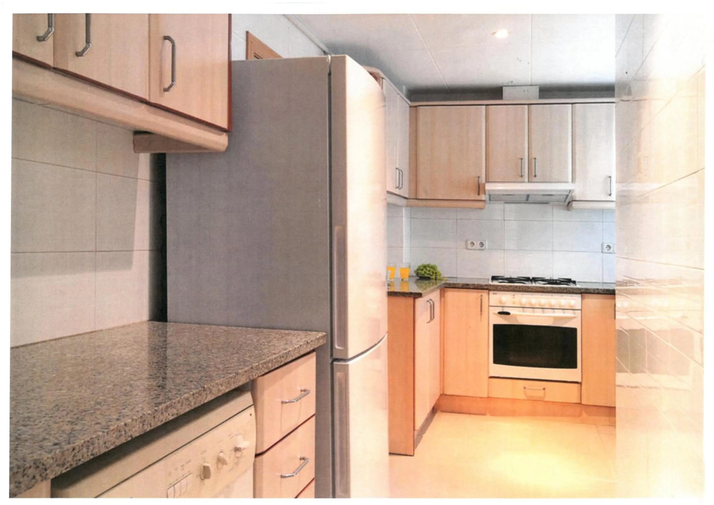 Kitchen or kitchenette in Serennia Apartamentos Ramblas - Plaça Catalunya