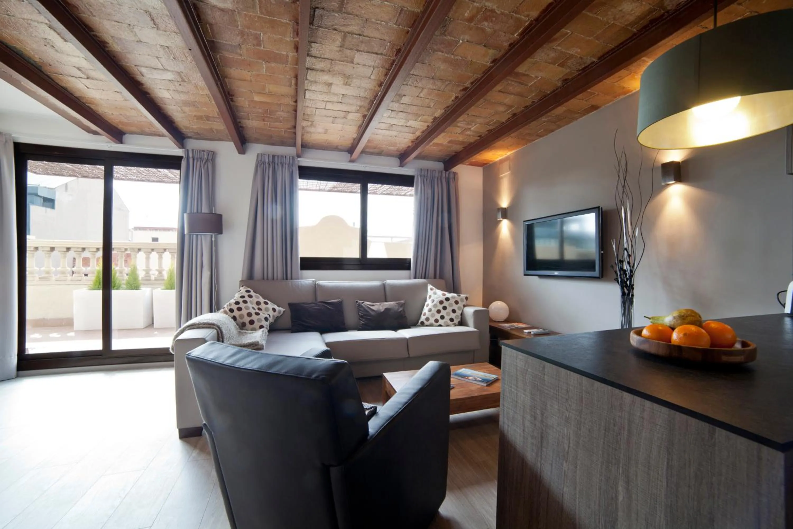 Kitchen or kitchenette in Serennia Apartamentos Ramblas - Plaça Catalunya