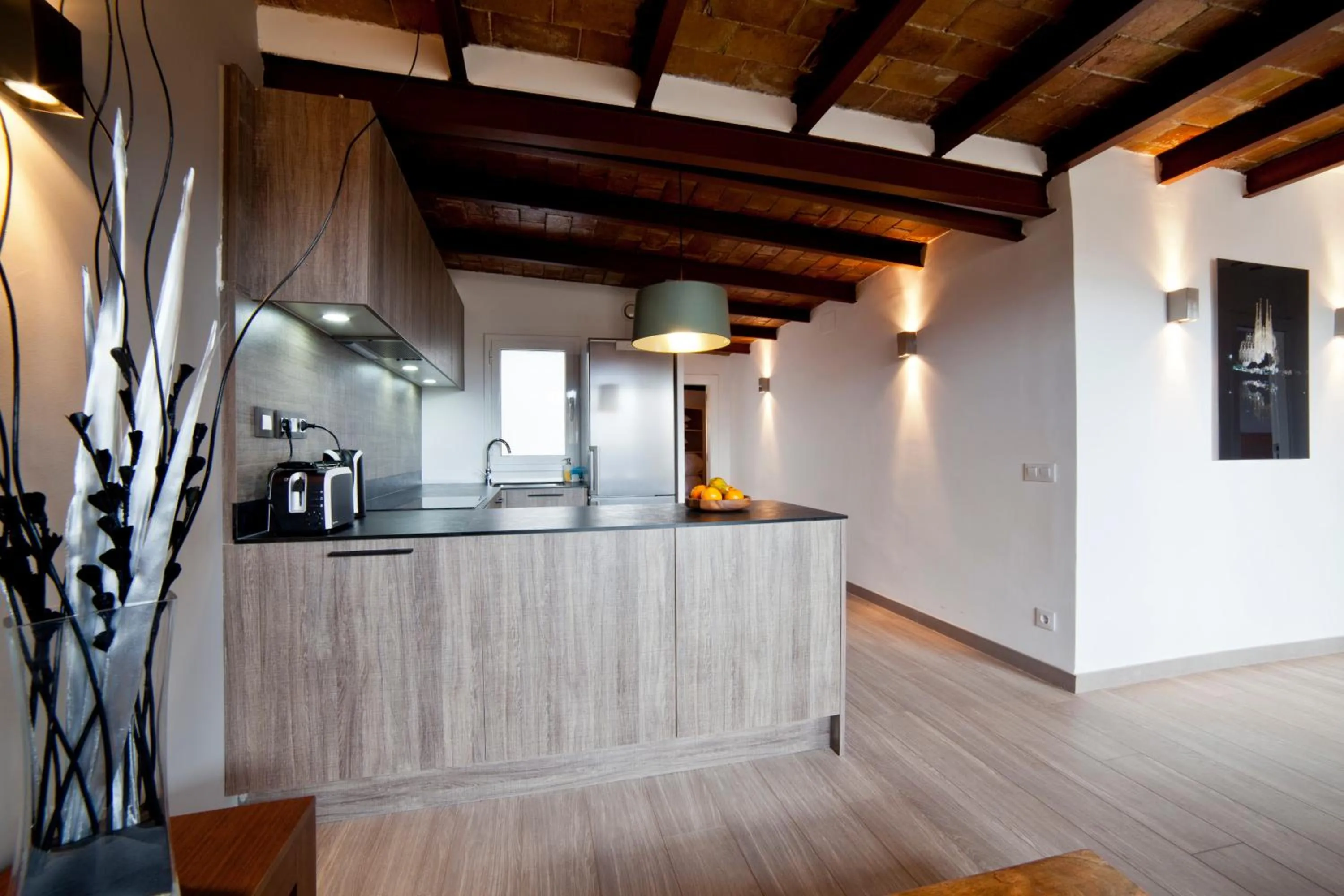 Kitchen or kitchenette in Serennia Apartamentos Ramblas - Plaça Catalunya