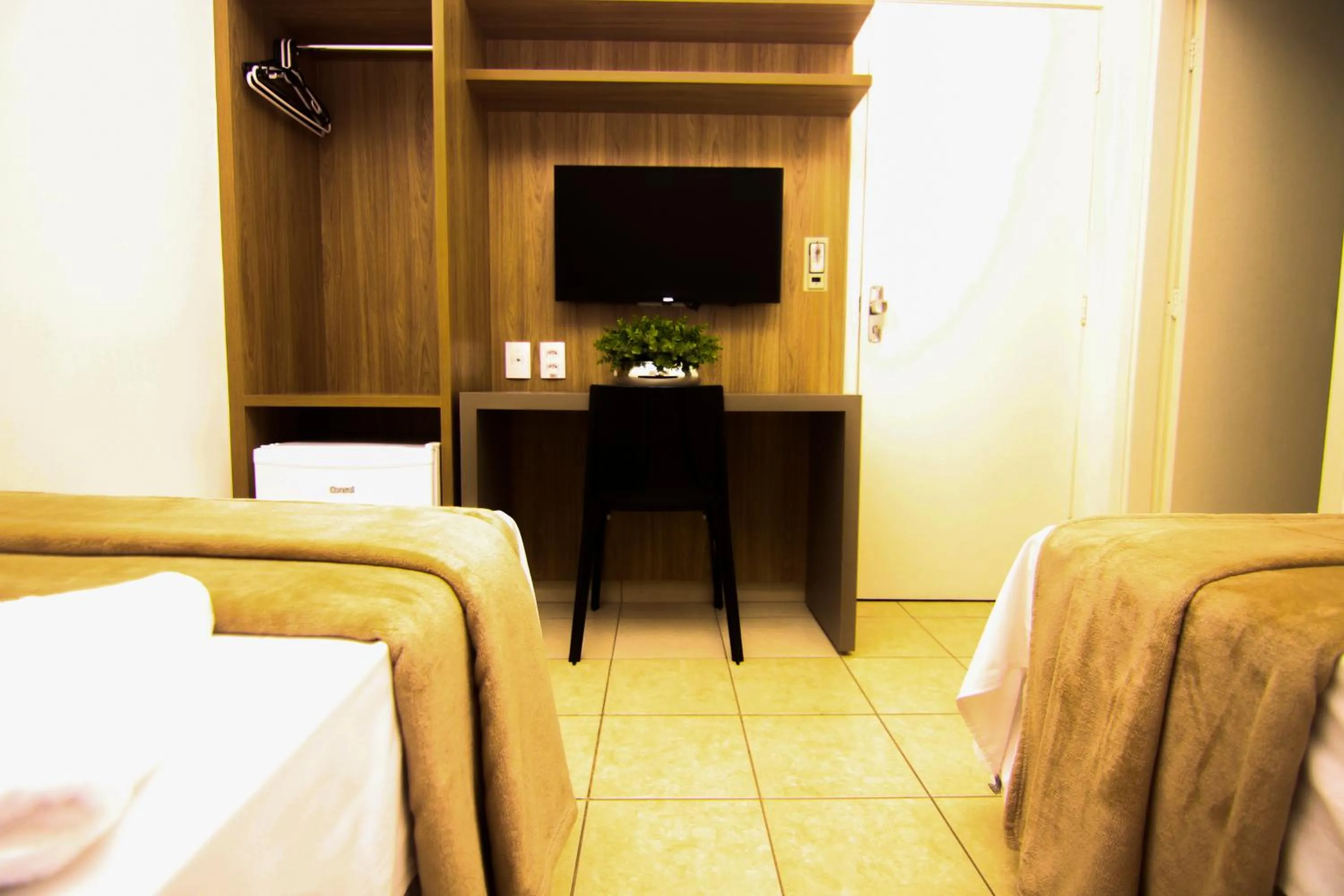 Seating area, Bed in Hotel Alpha