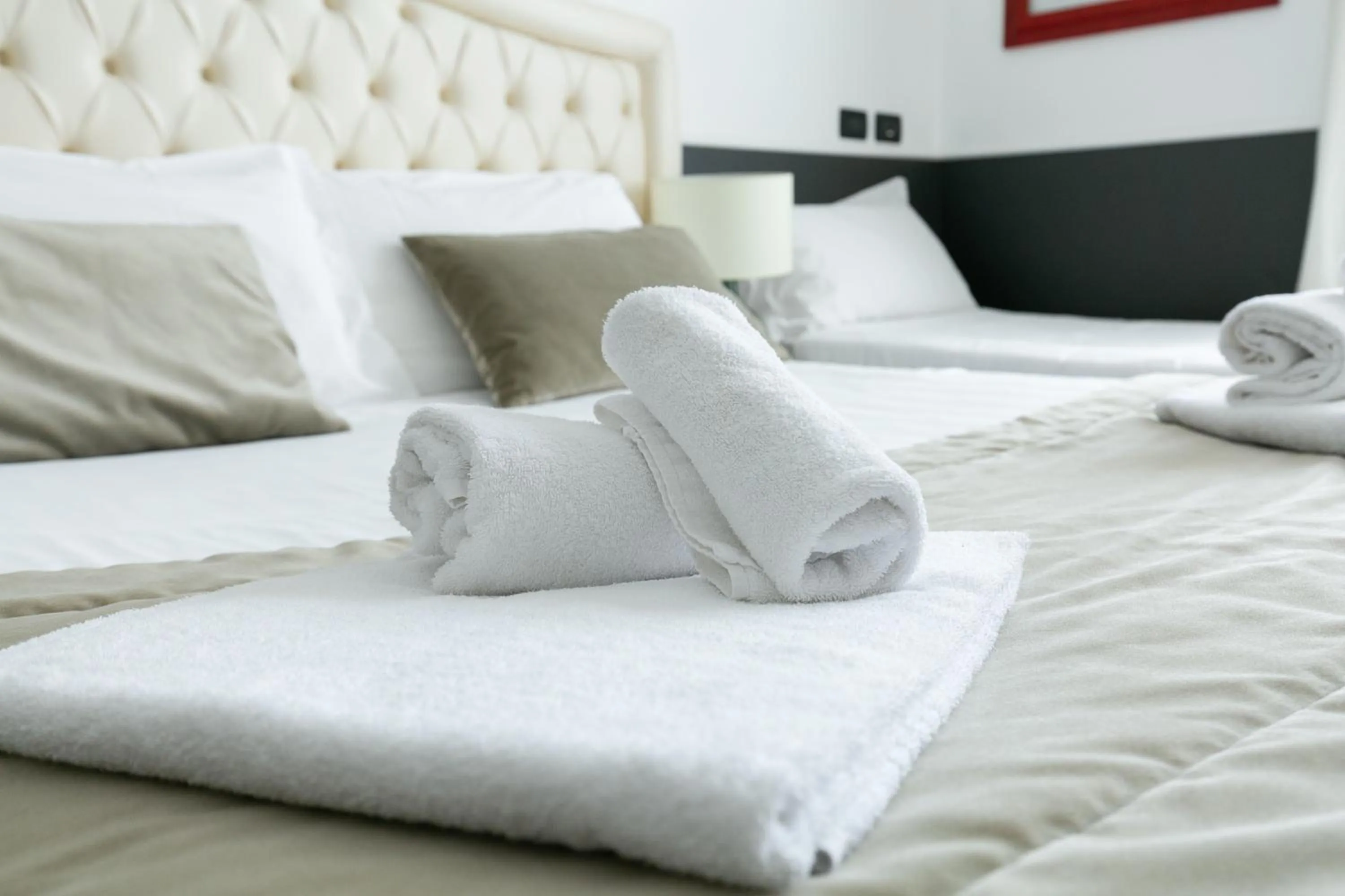 Bed in Capitolium Rooms