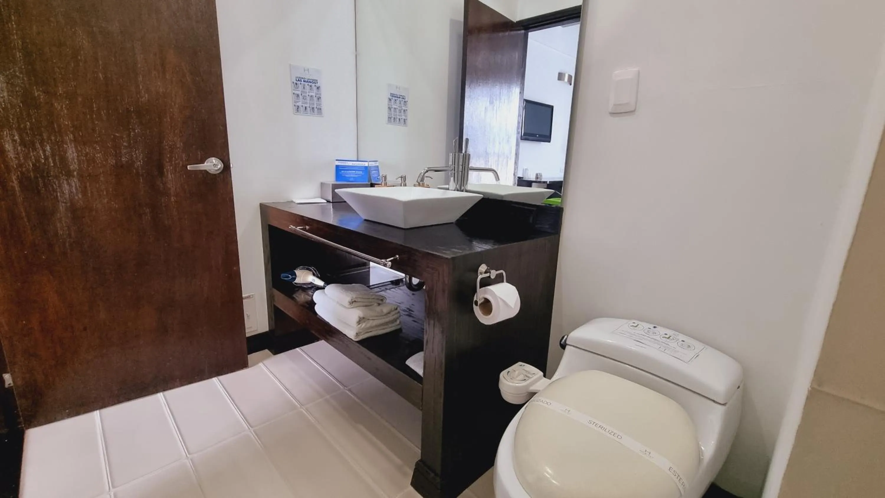 Bathroom in Habitat Suites Hotel By GHO Hoteles