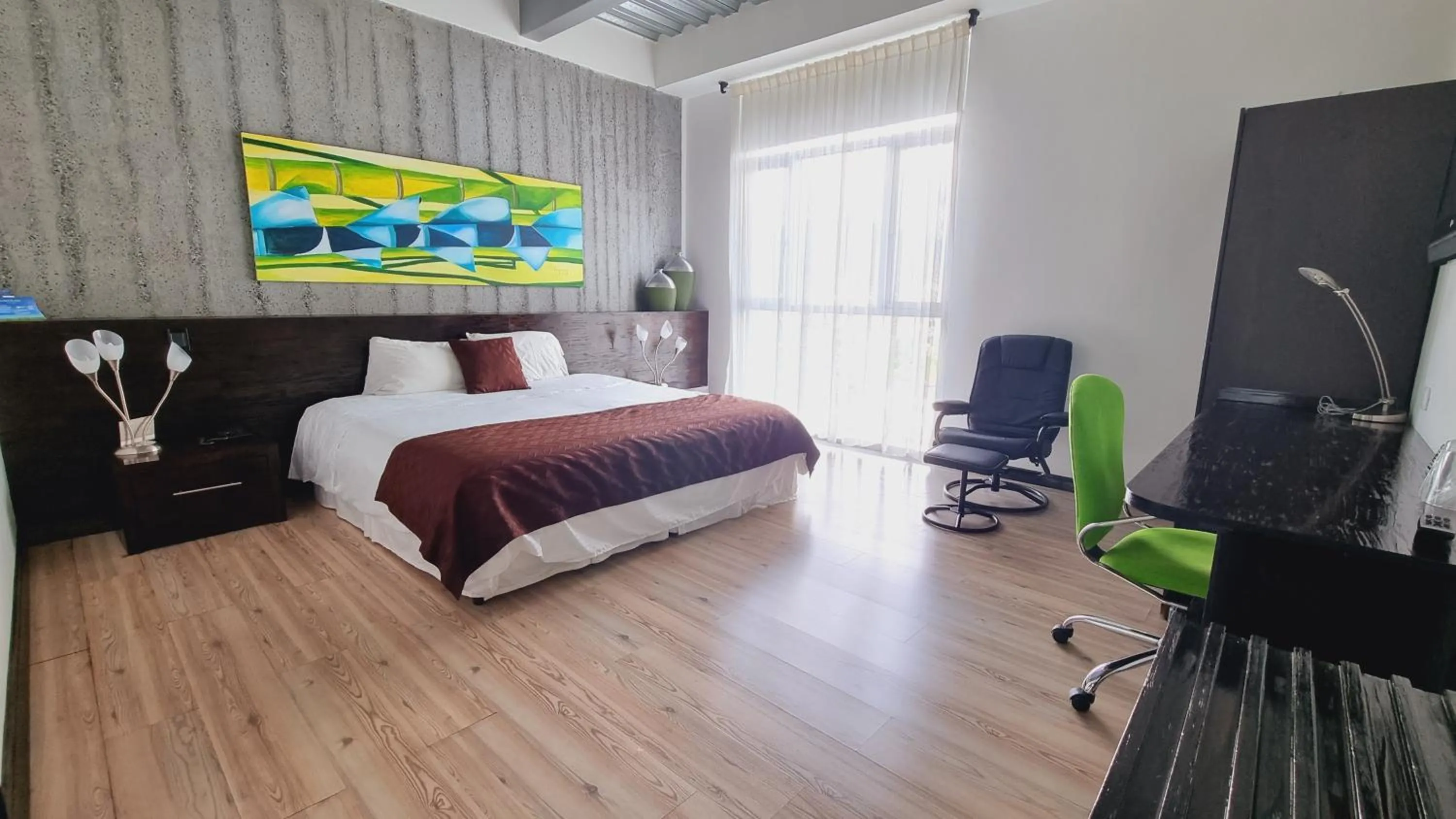 Bed in Habitat Suites Hotel By GHO Hoteles