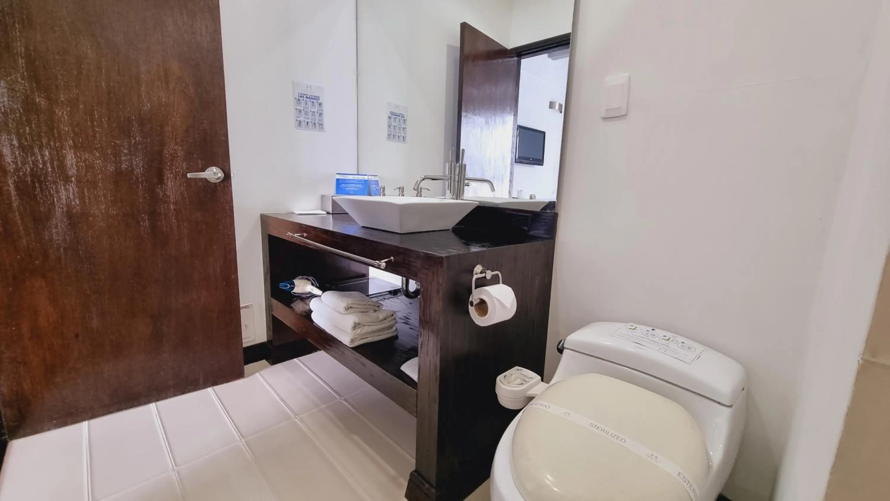 Bathroom in Habitat Suites Hotel By GHO Hoteles