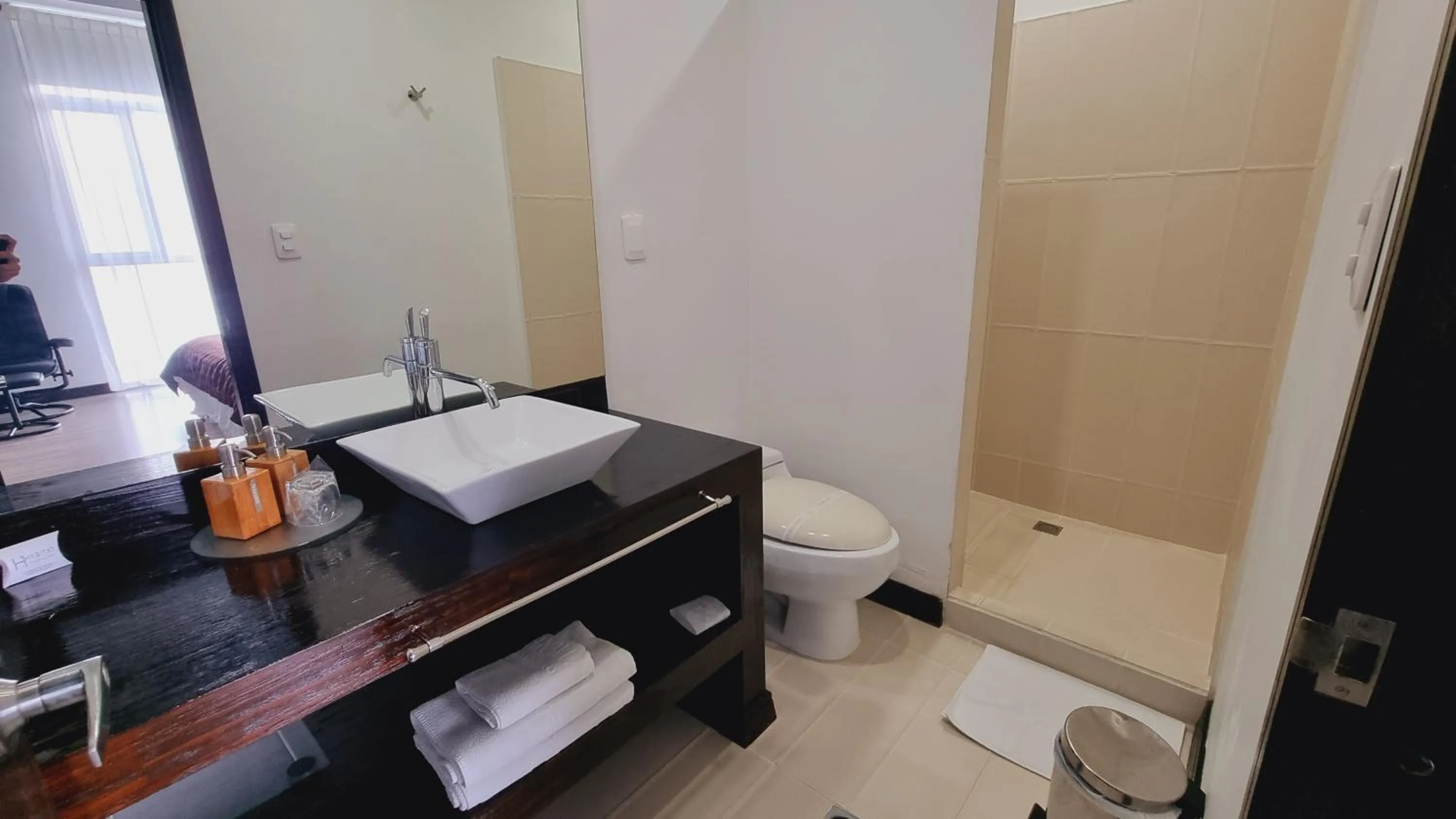 Bathroom in Habitat Suites Hotel By GHO Hoteles