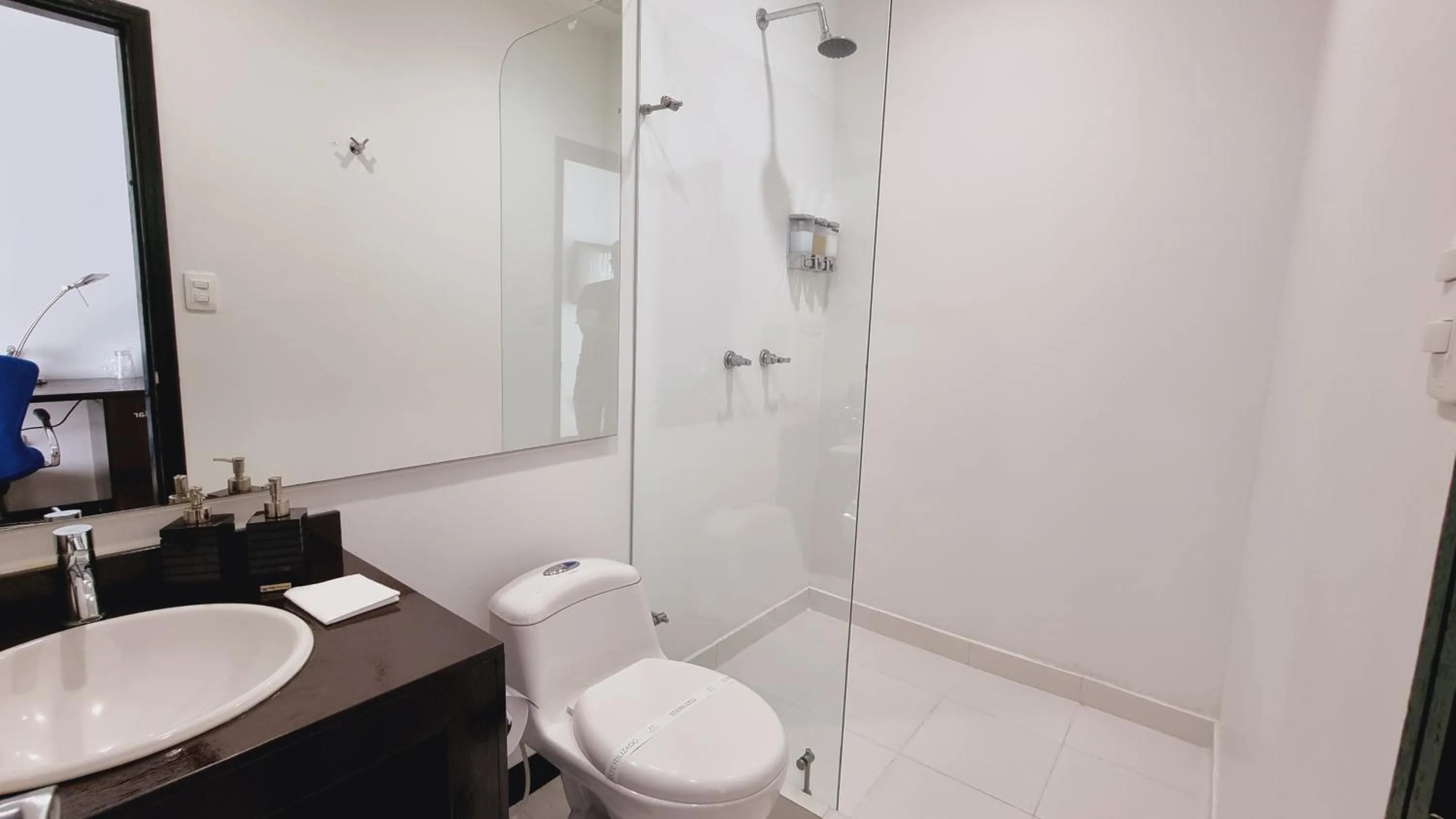 Bathroom in Habitat Suites Hotel By GHO Hoteles