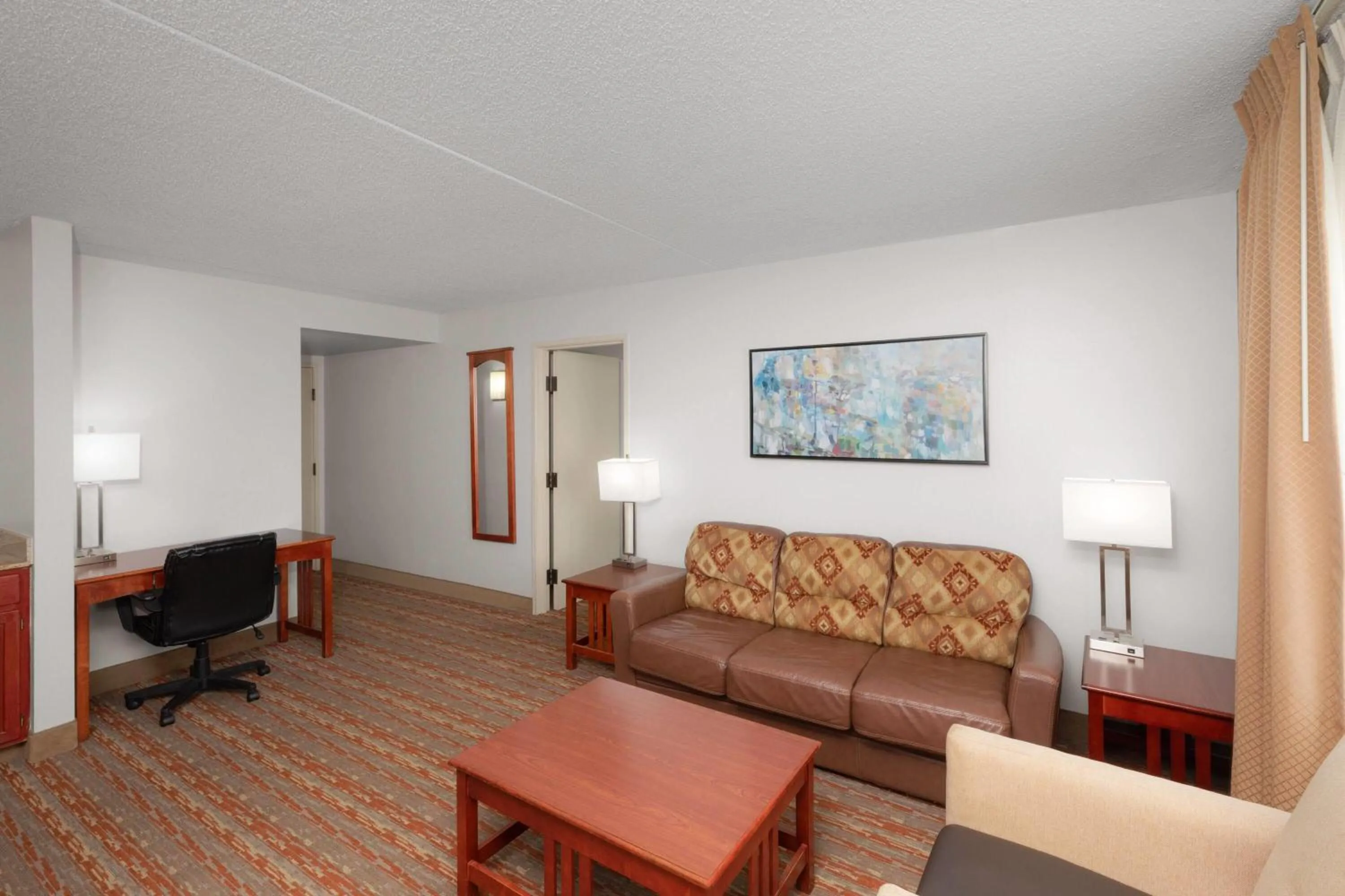 Photo of the whole room in Endeavor Inn & Suites, Trademark Collection by Wyndham