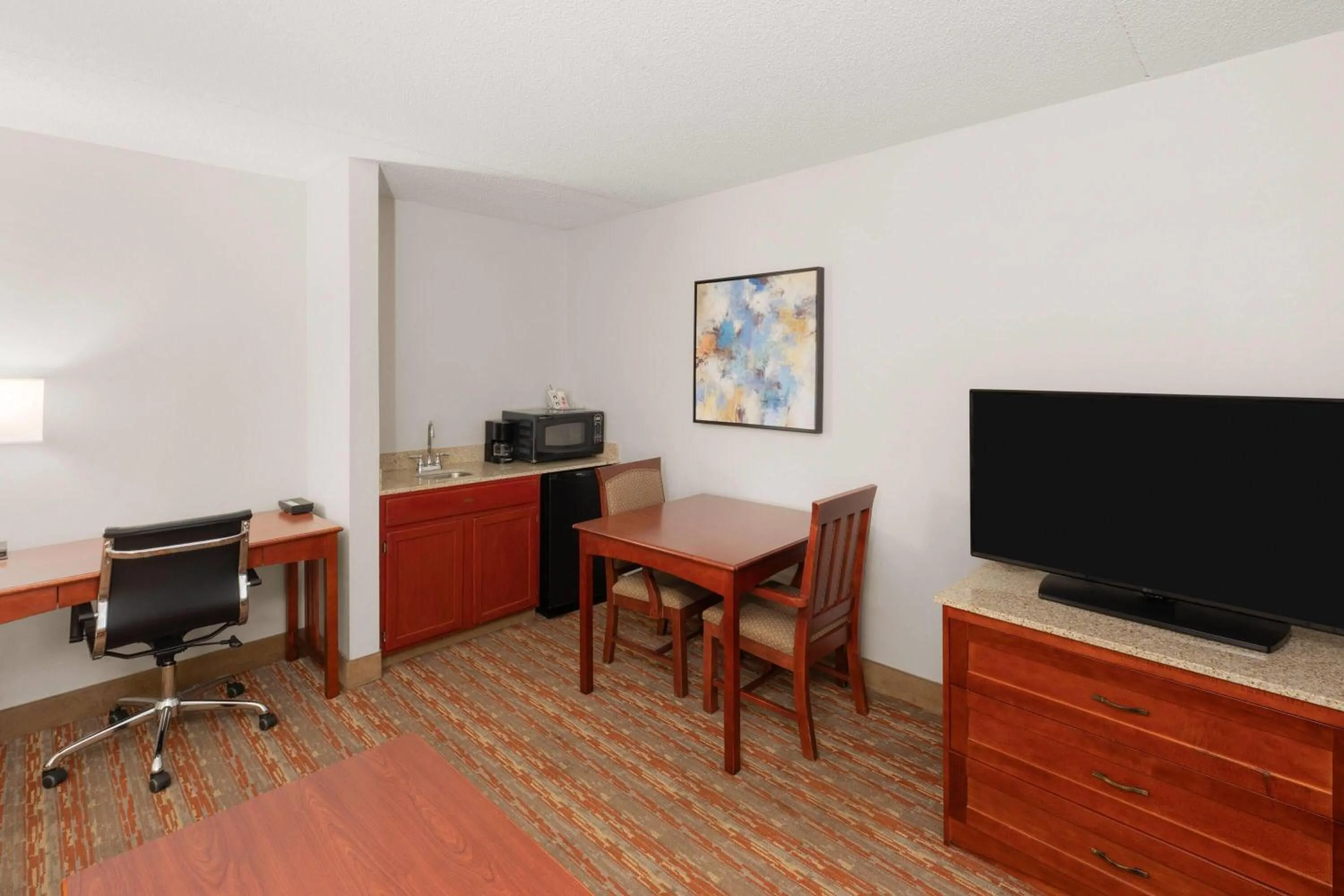 Photo of the whole room in Endeavor Inn & Suites, Trademark Collection by Wyndham