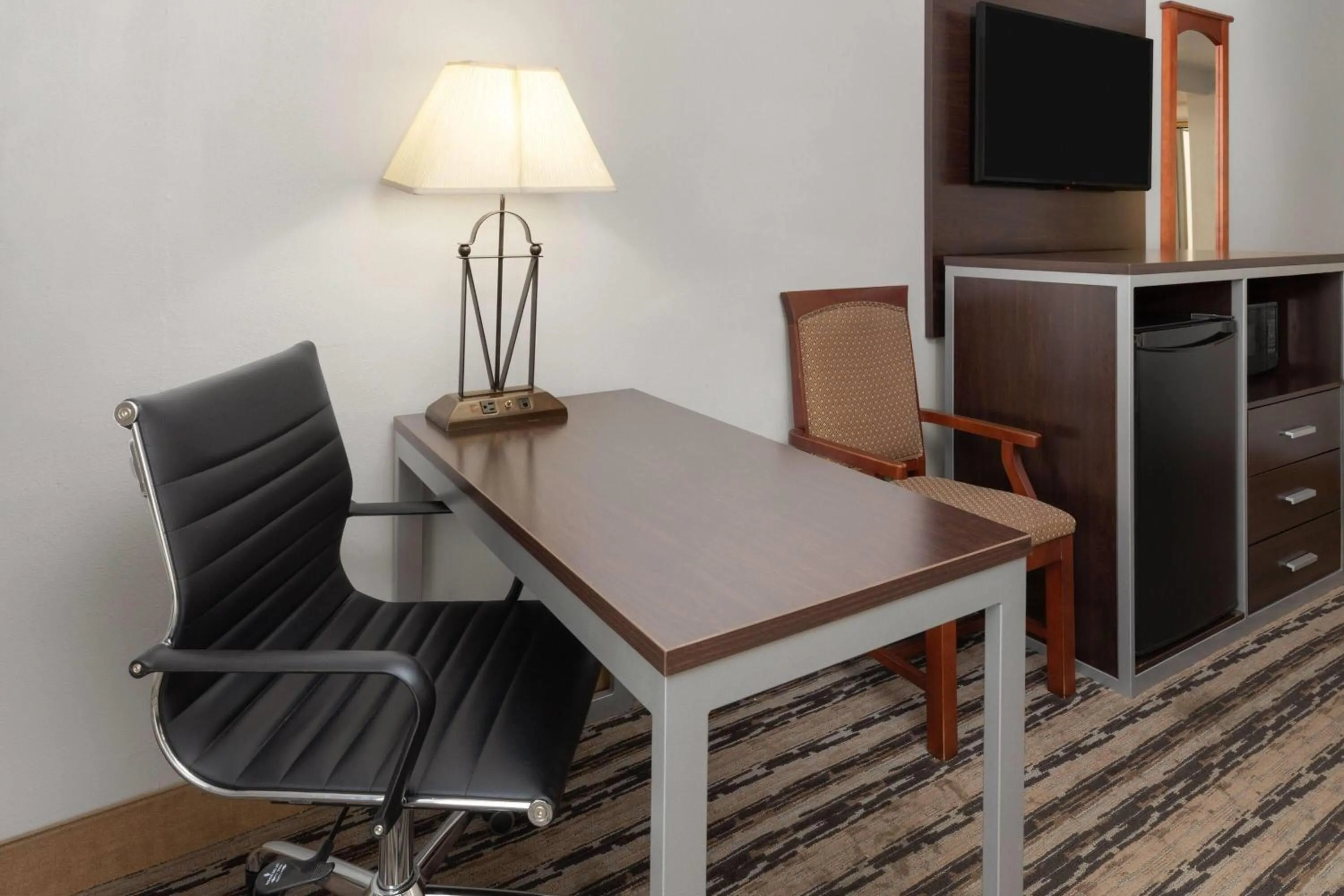 Photo of the whole room in Endeavor Inn & Suites, Trademark Collection by Wyndham