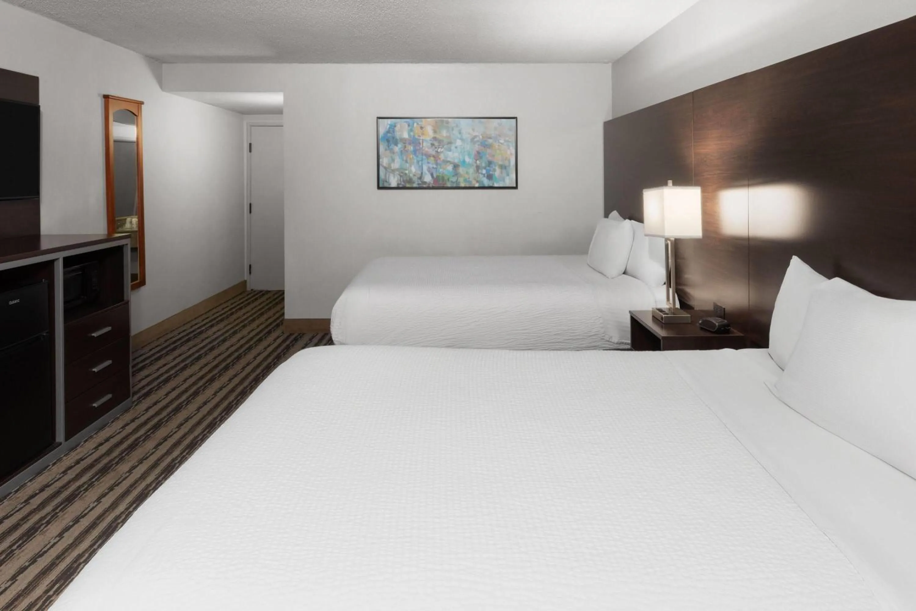 Photo of the whole room, Bed in Endeavor Inn & Suites, Trademark Collection by Wyndham