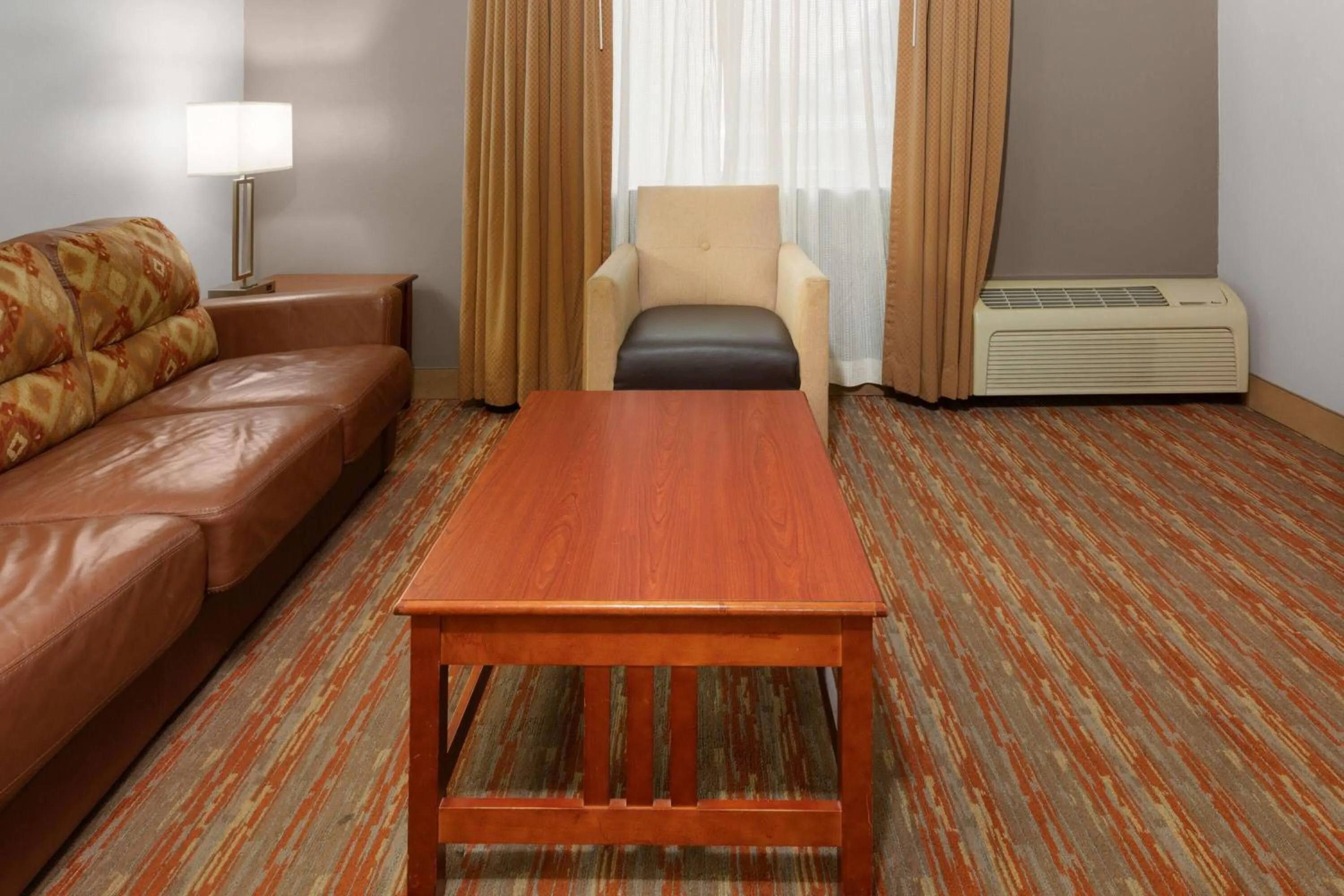 Photo of the whole room in Endeavor Inn & Suites, Trademark Collection by Wyndham