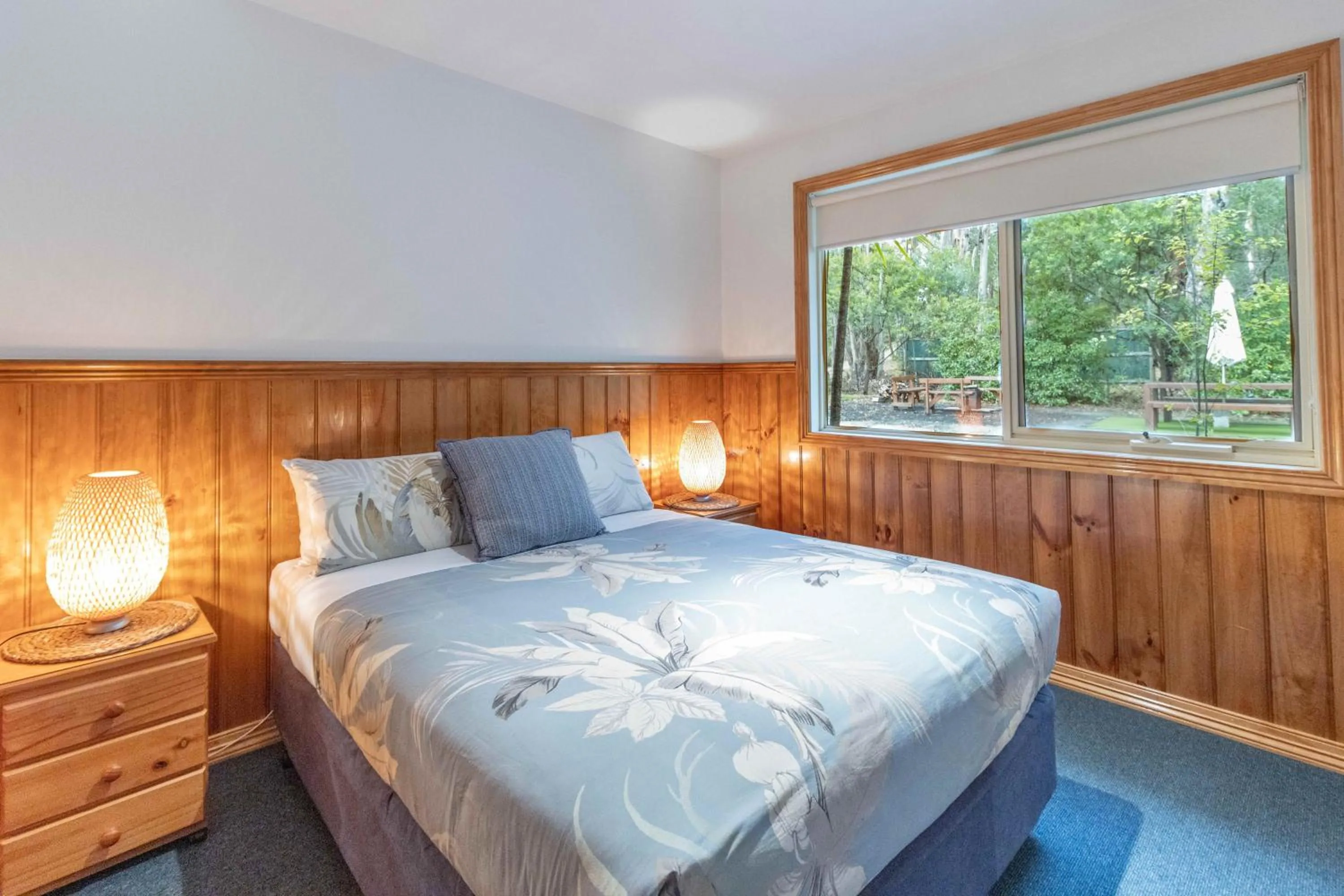 Bed in Lorne Bush House Cottages & Eco Retreats