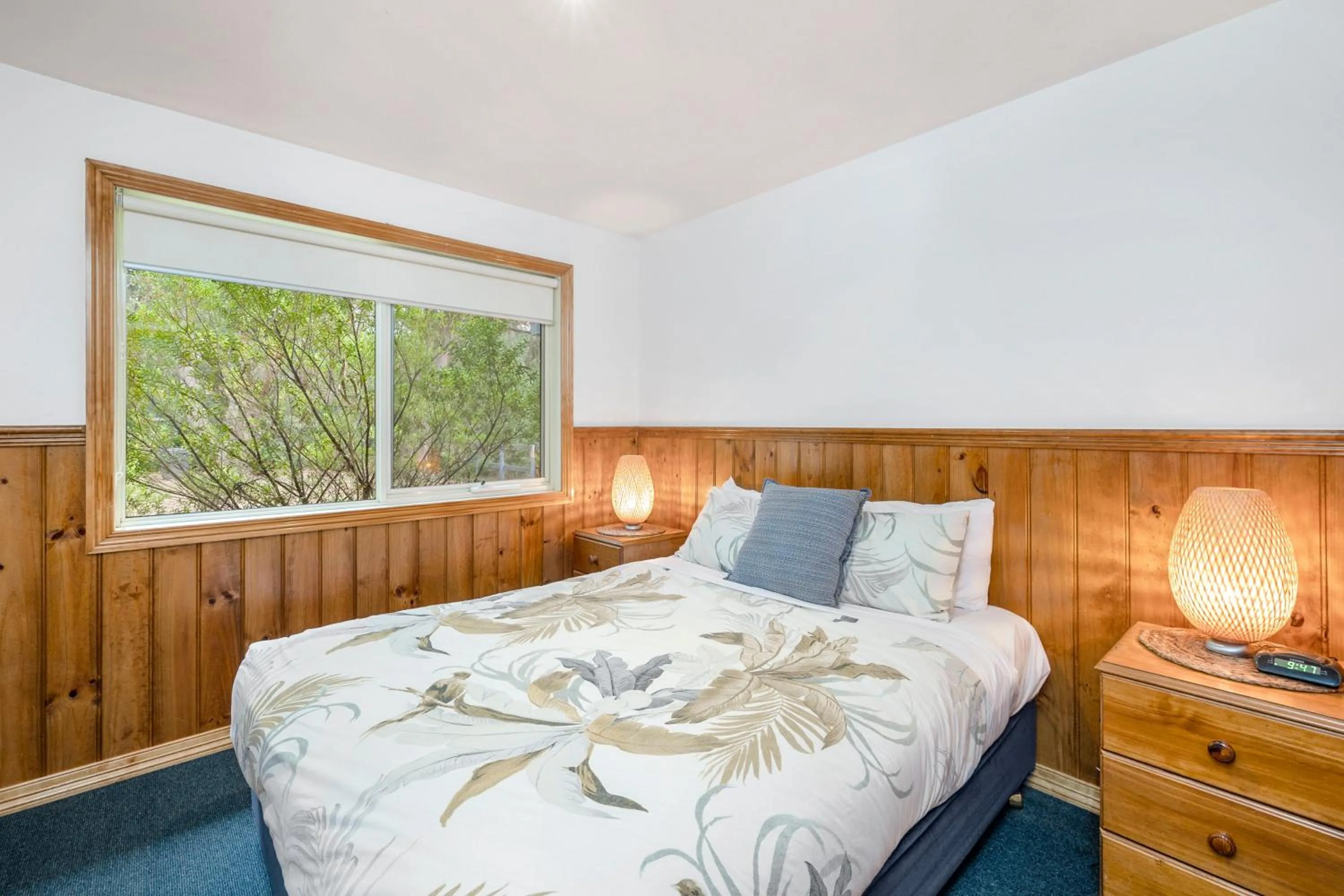 Bed in Lorne Bush House Cottages & Eco Retreats