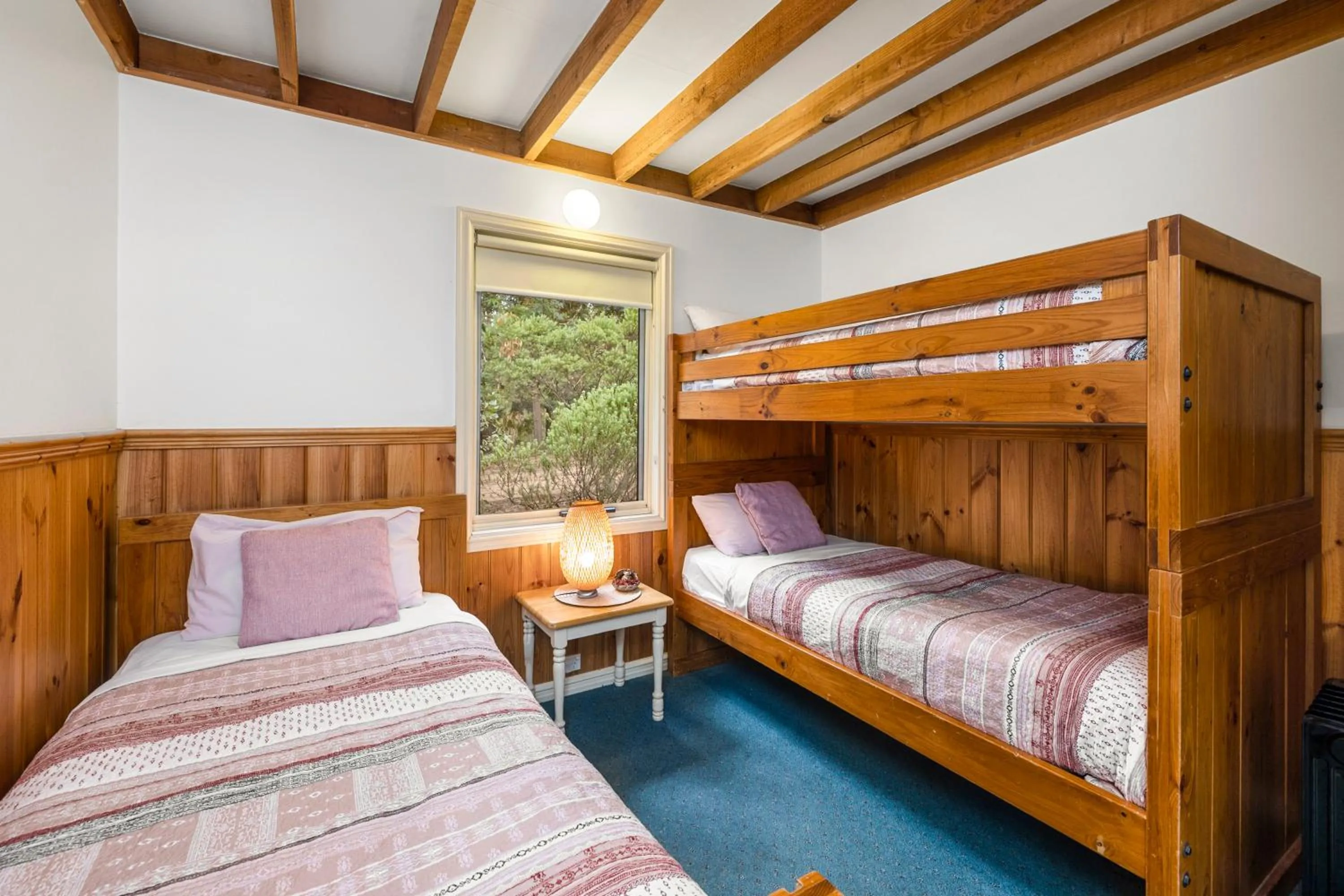 Bed in Lorne Bush House Cottages & Eco Retreats
