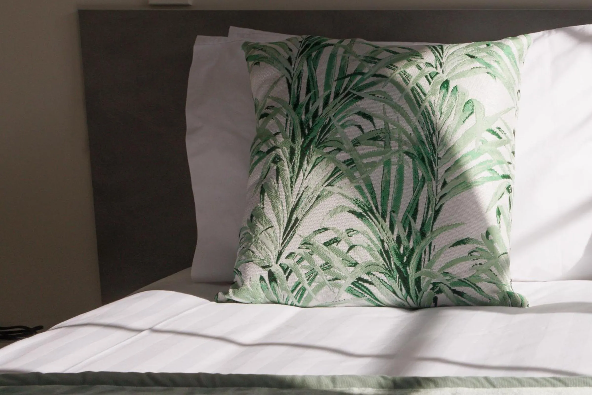 Bed in BK's Pohutukawa Lodge