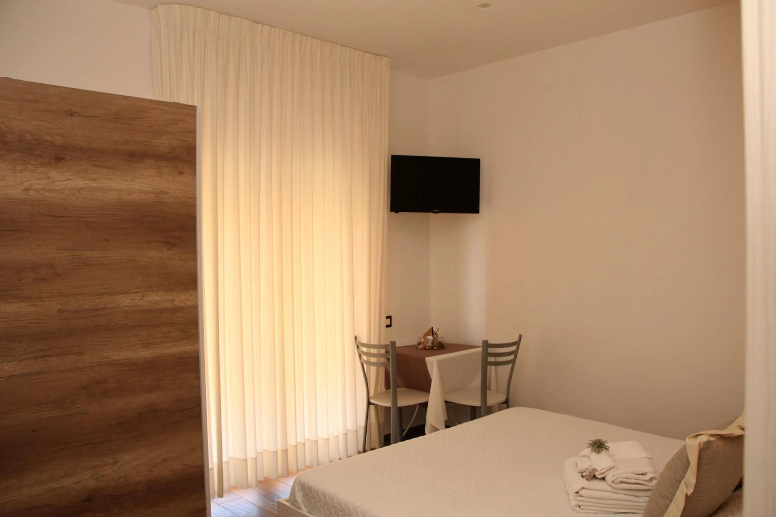 Bed in B&B Damiantò