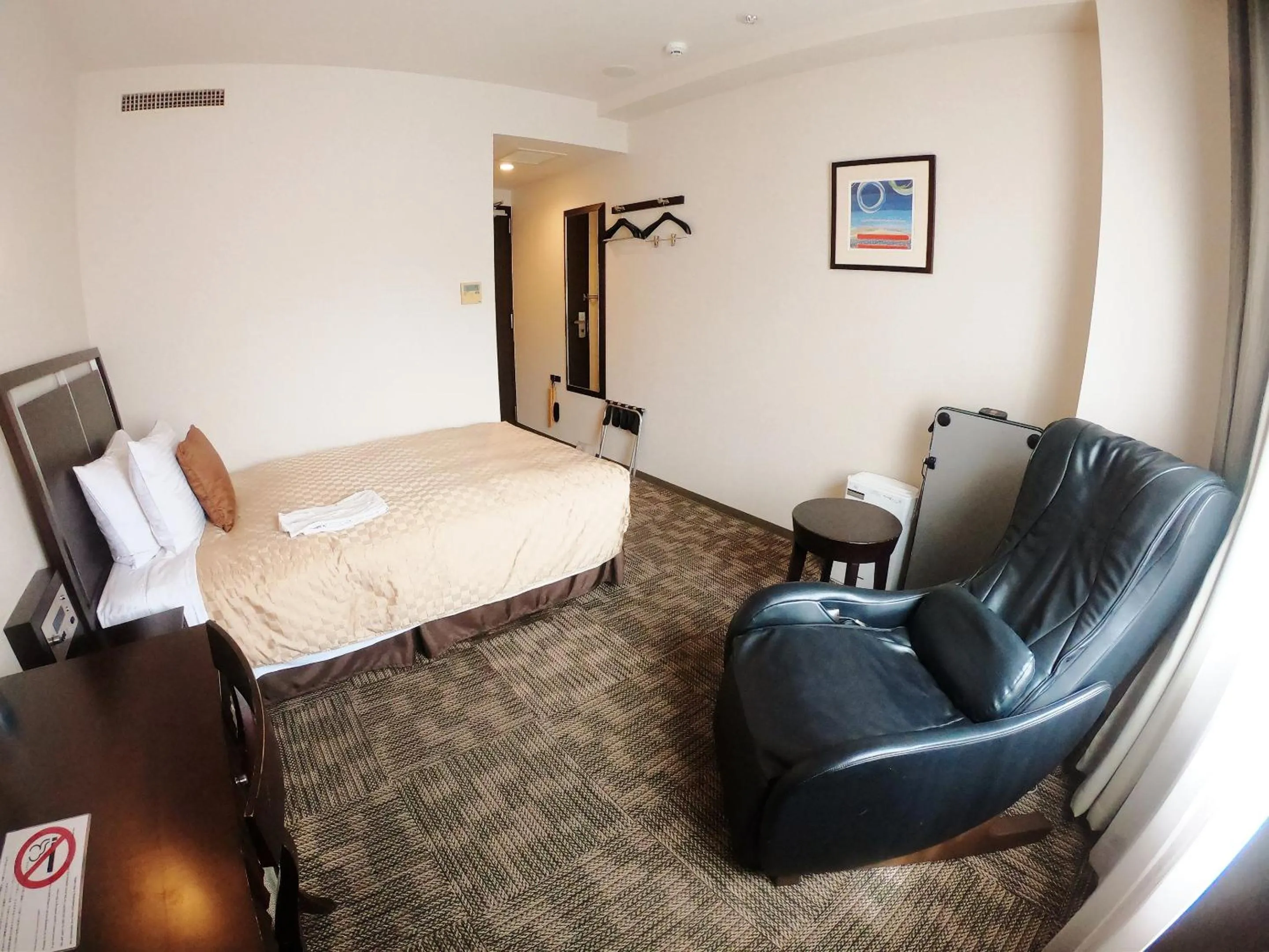 Photo of the whole room, Bed in Sol Vita Hotel Naha