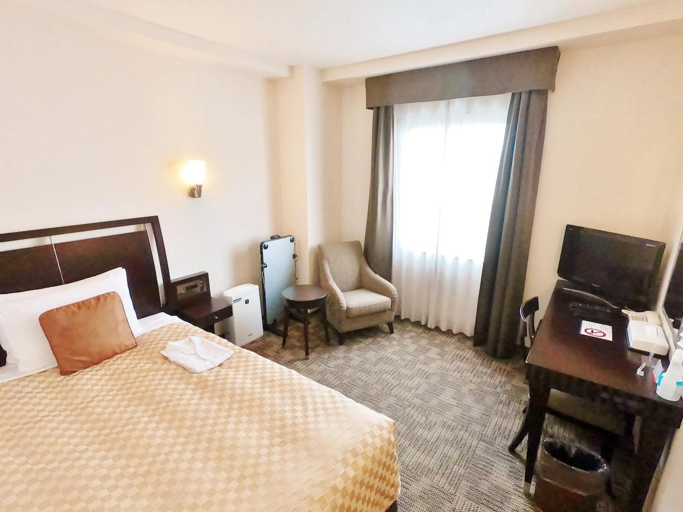 Photo of the whole room, Bed in Sol Vita Hotel Naha