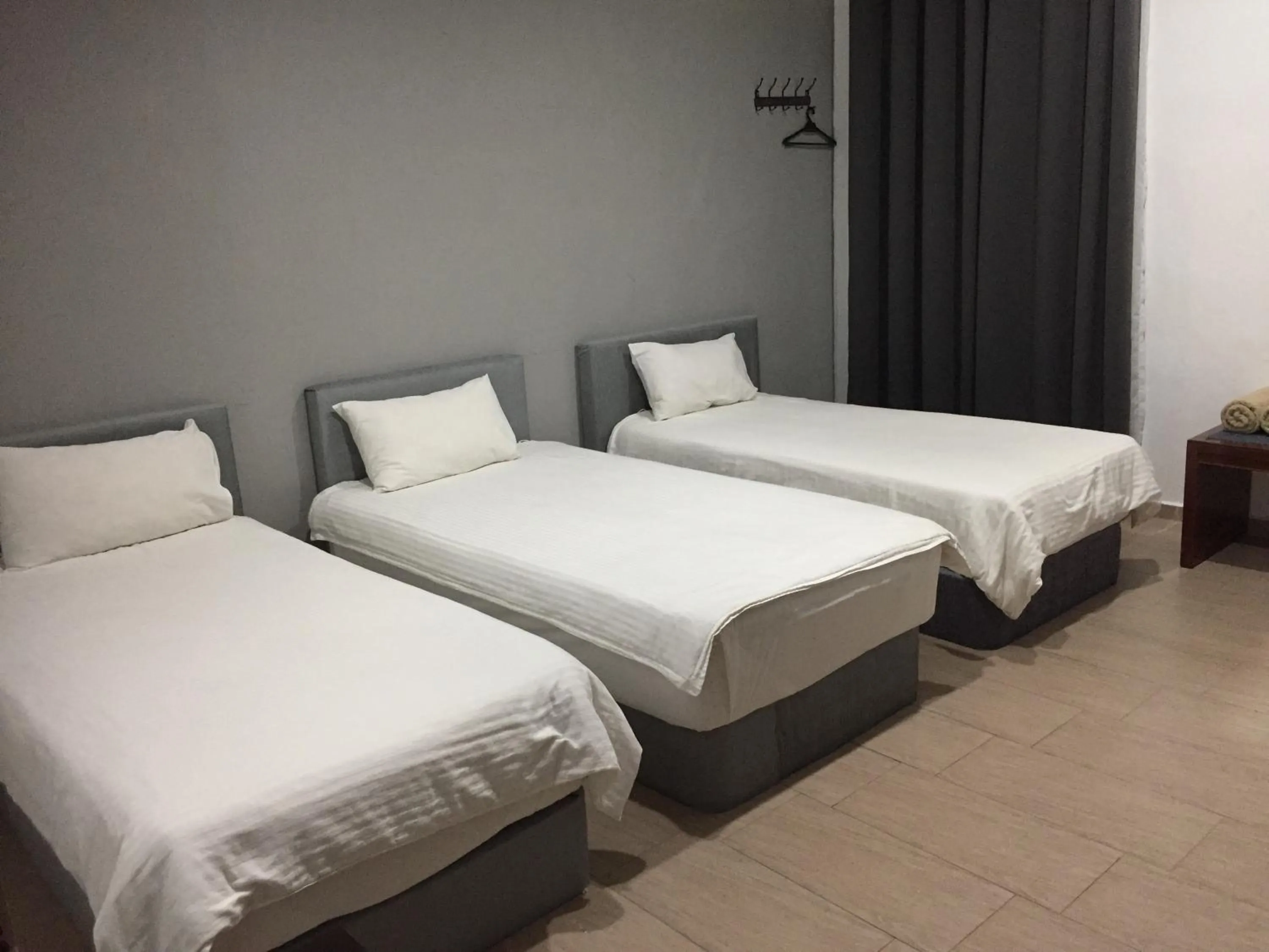 Bed in HOTEL SHAFURA 1