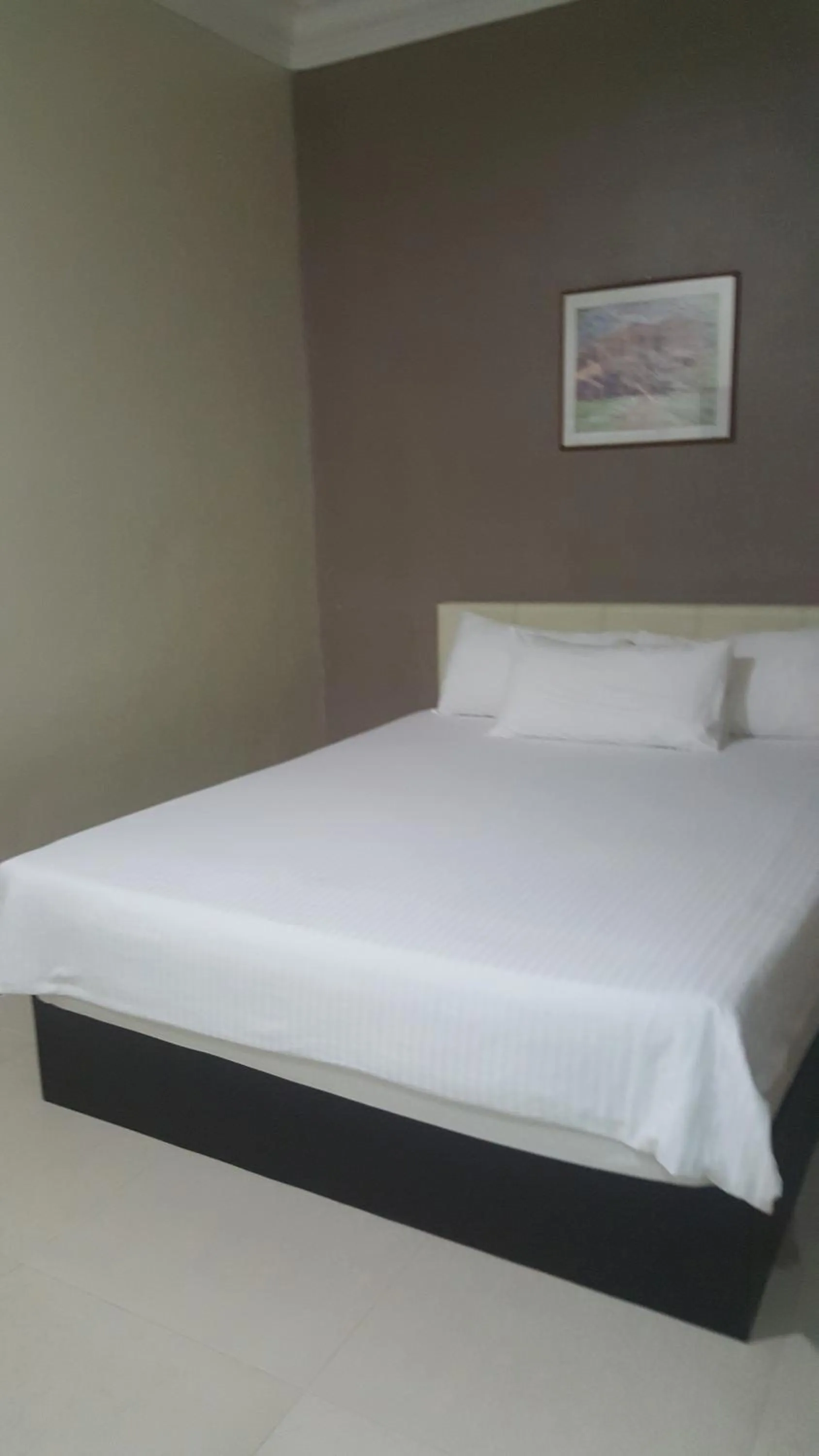 Bed in HOTEL SHAFURA 1