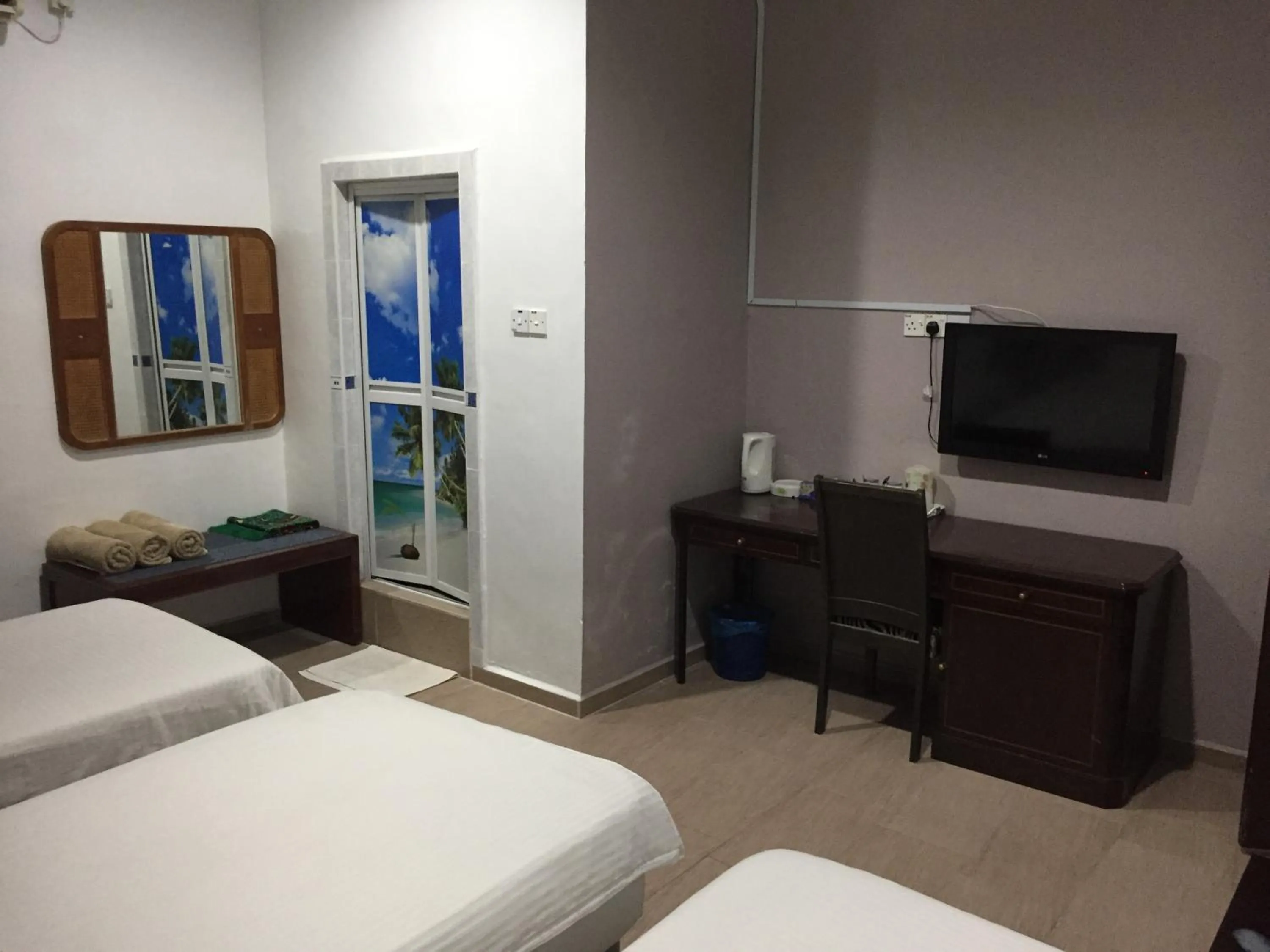 Bed in HOTEL SHAFURA 1