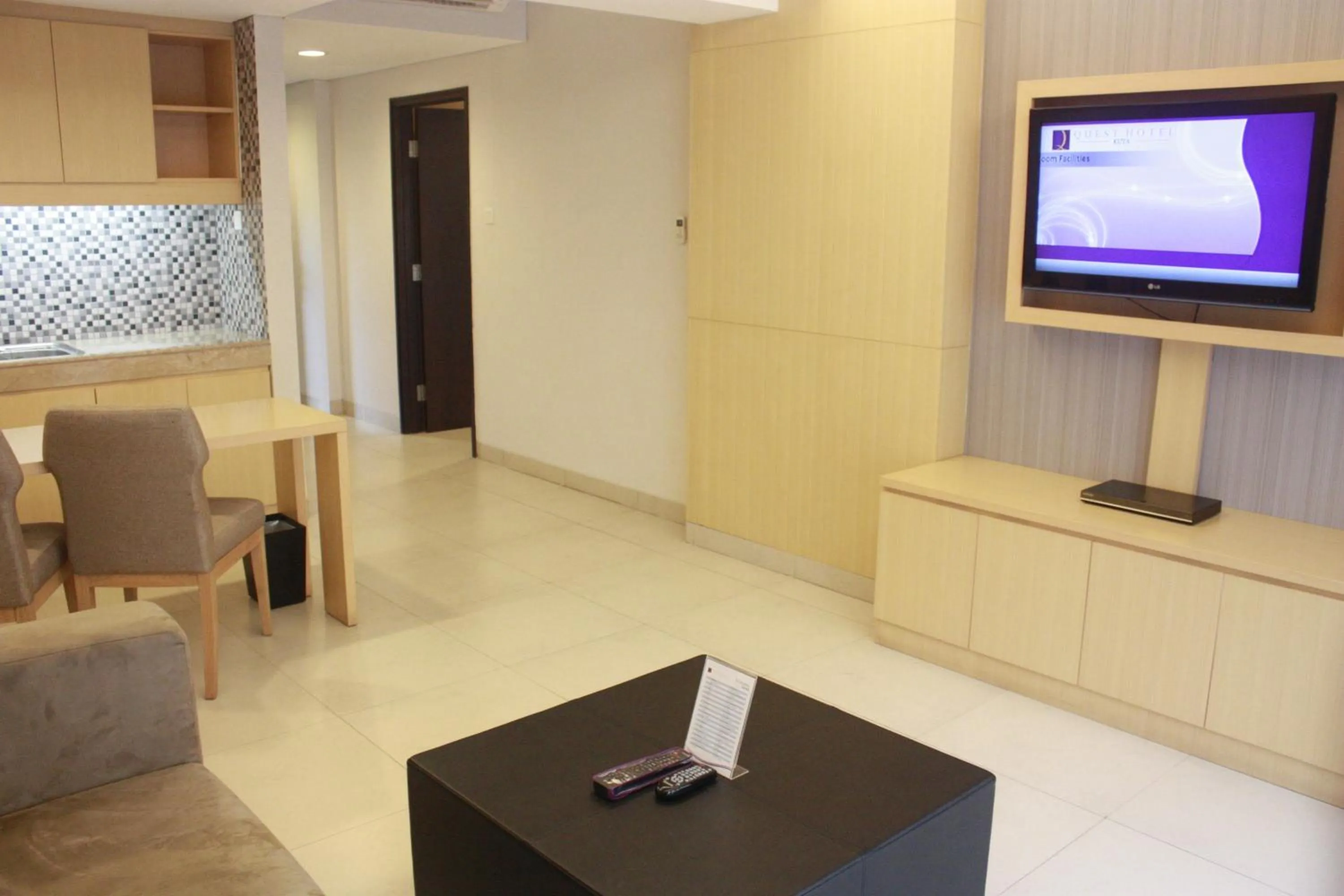 Bedroom in Quest Hotel Kuta by ASTON