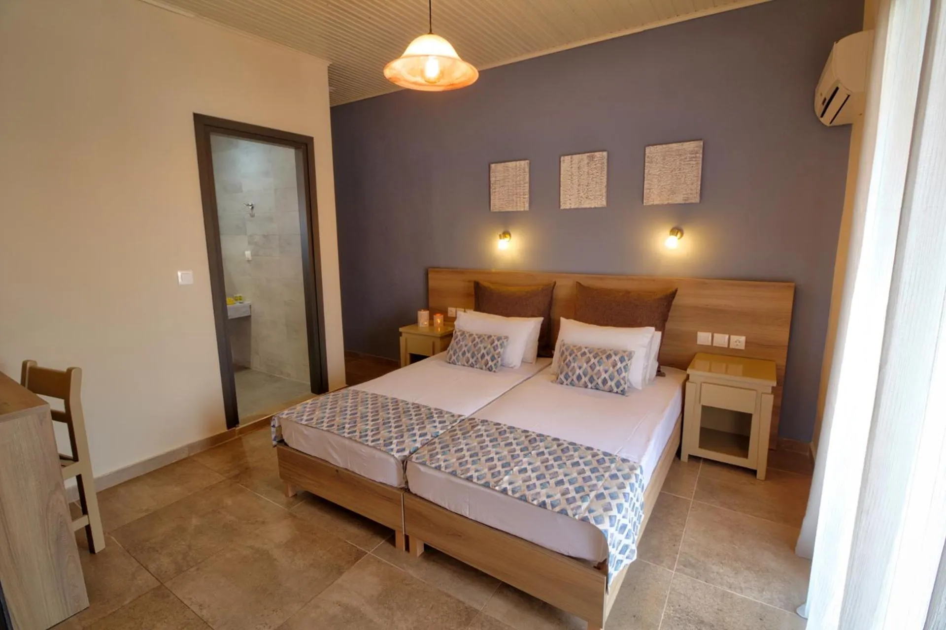 Bed in Two Brothers Studios & Apts