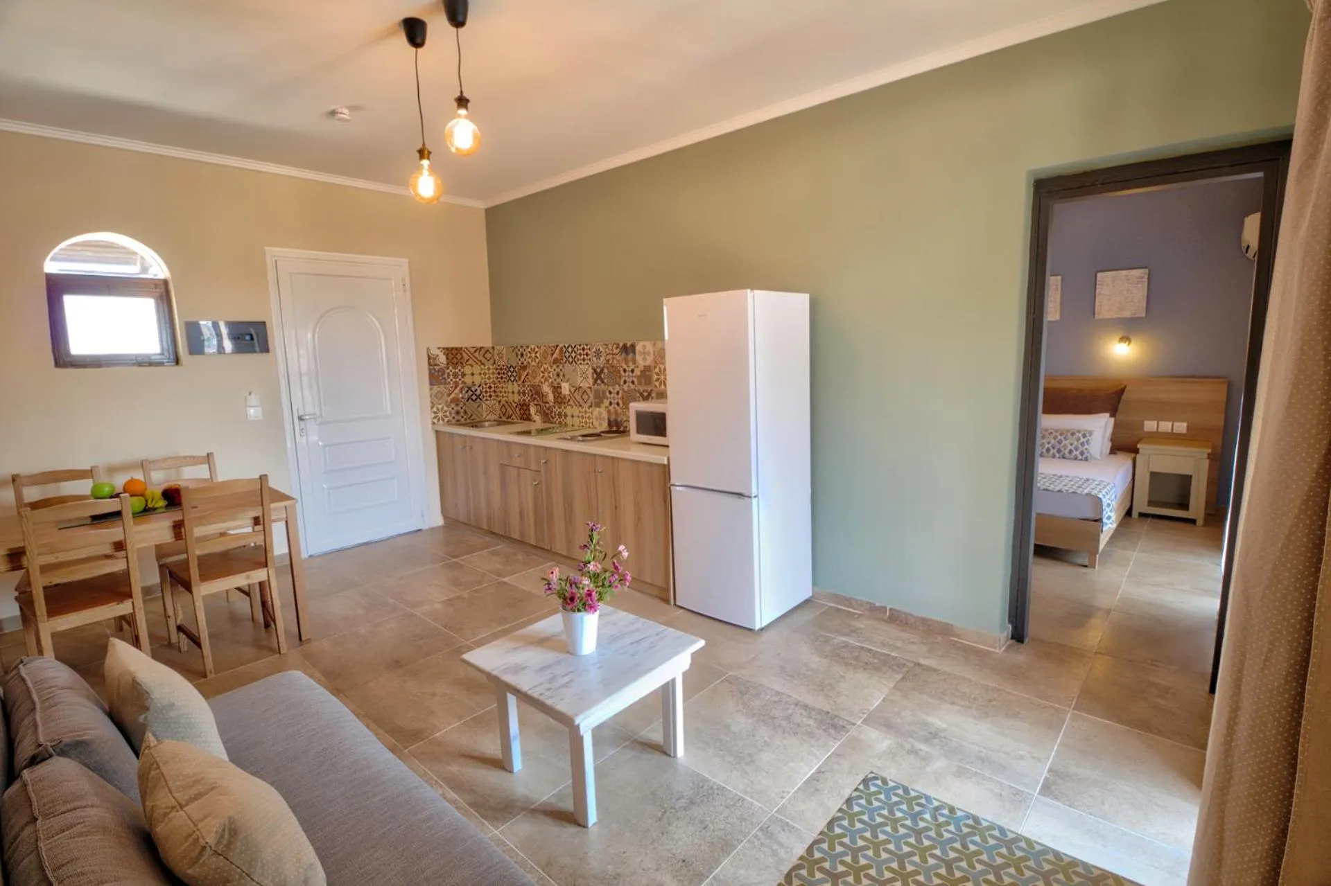 Kitchen or kitchenette, Bed in Two Brothers Studios & Apts