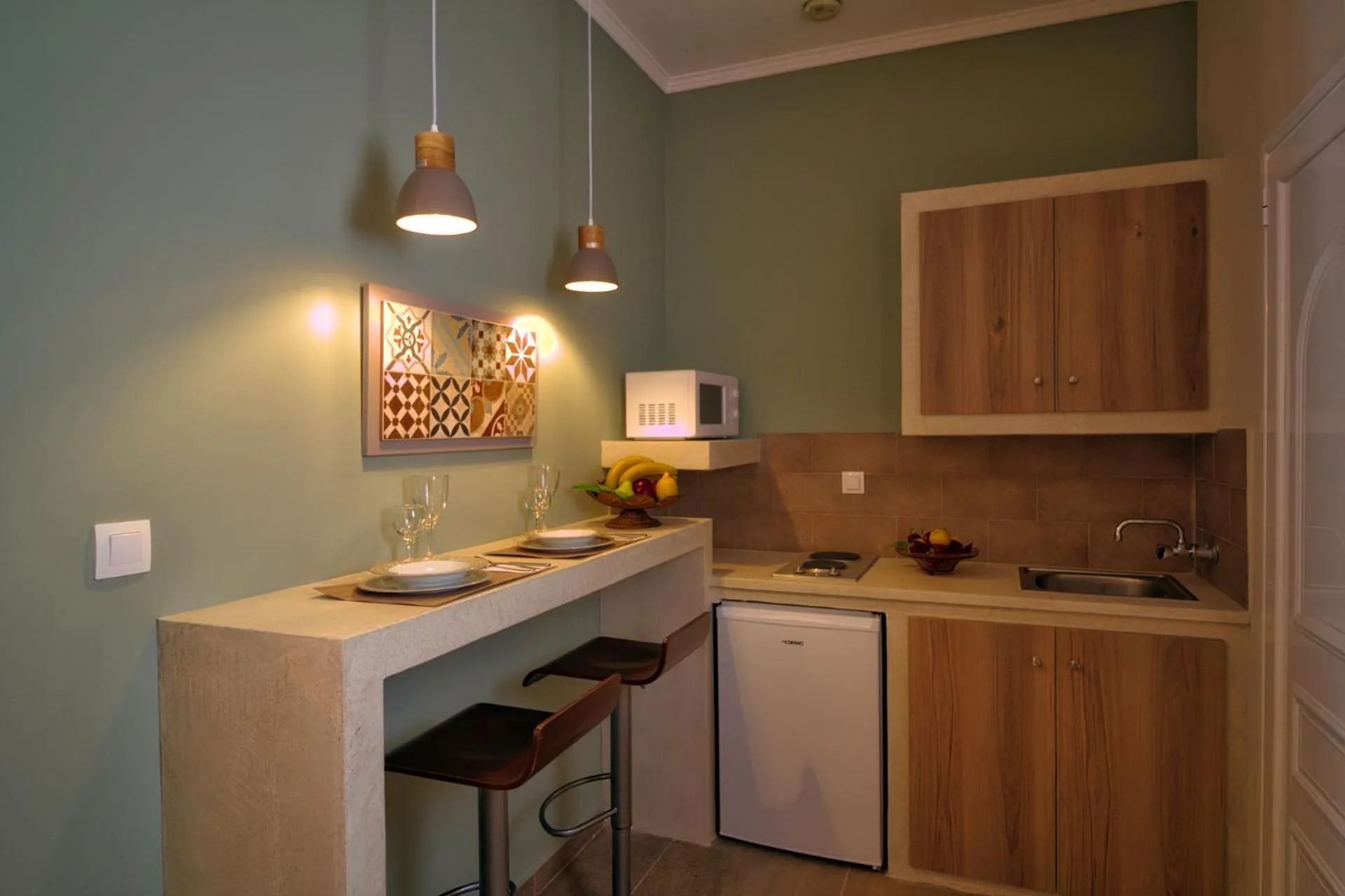 Kitchen or kitchenette in Two Brothers Studios & Apts