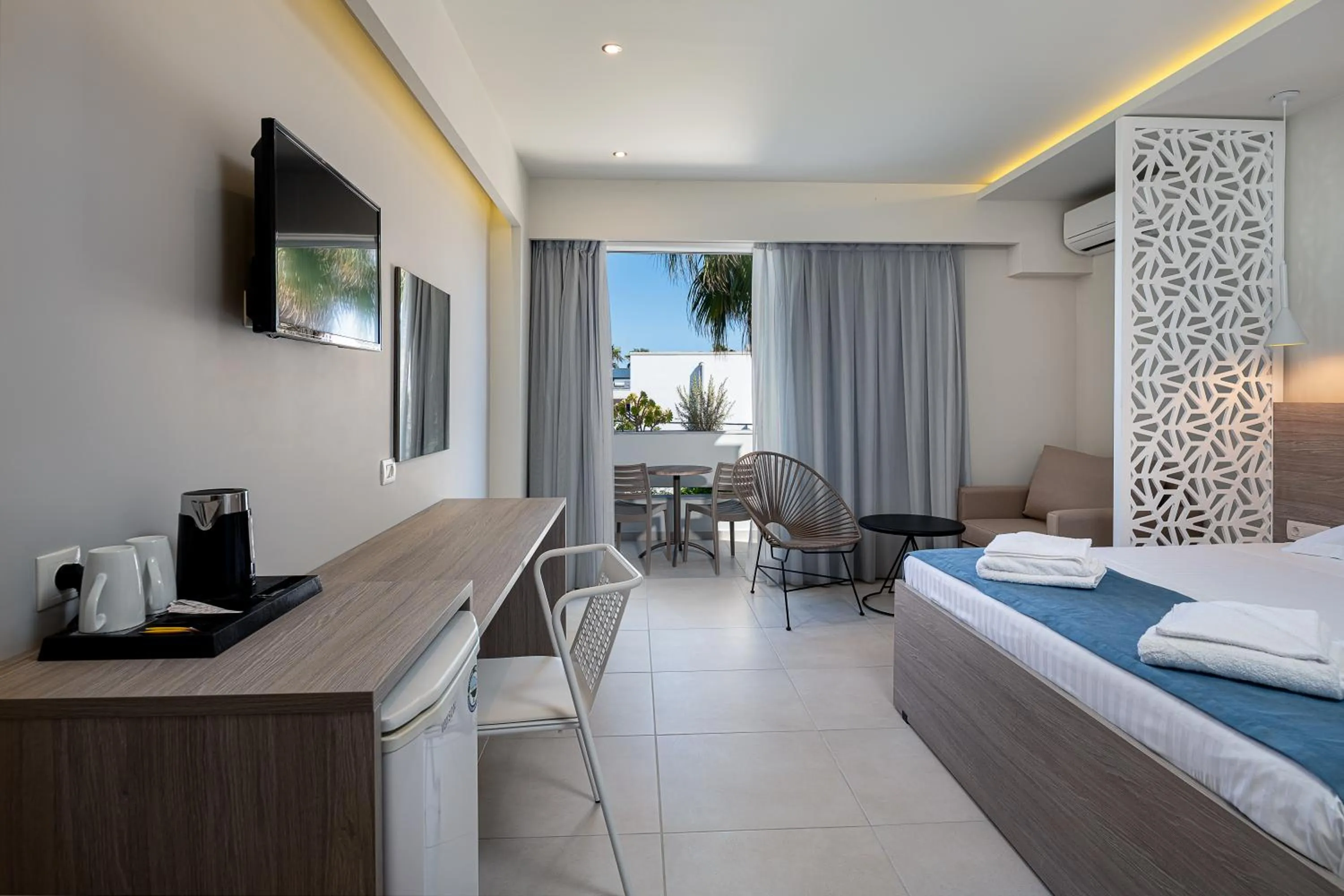 Photo of the whole room, Bed in Sunny Days