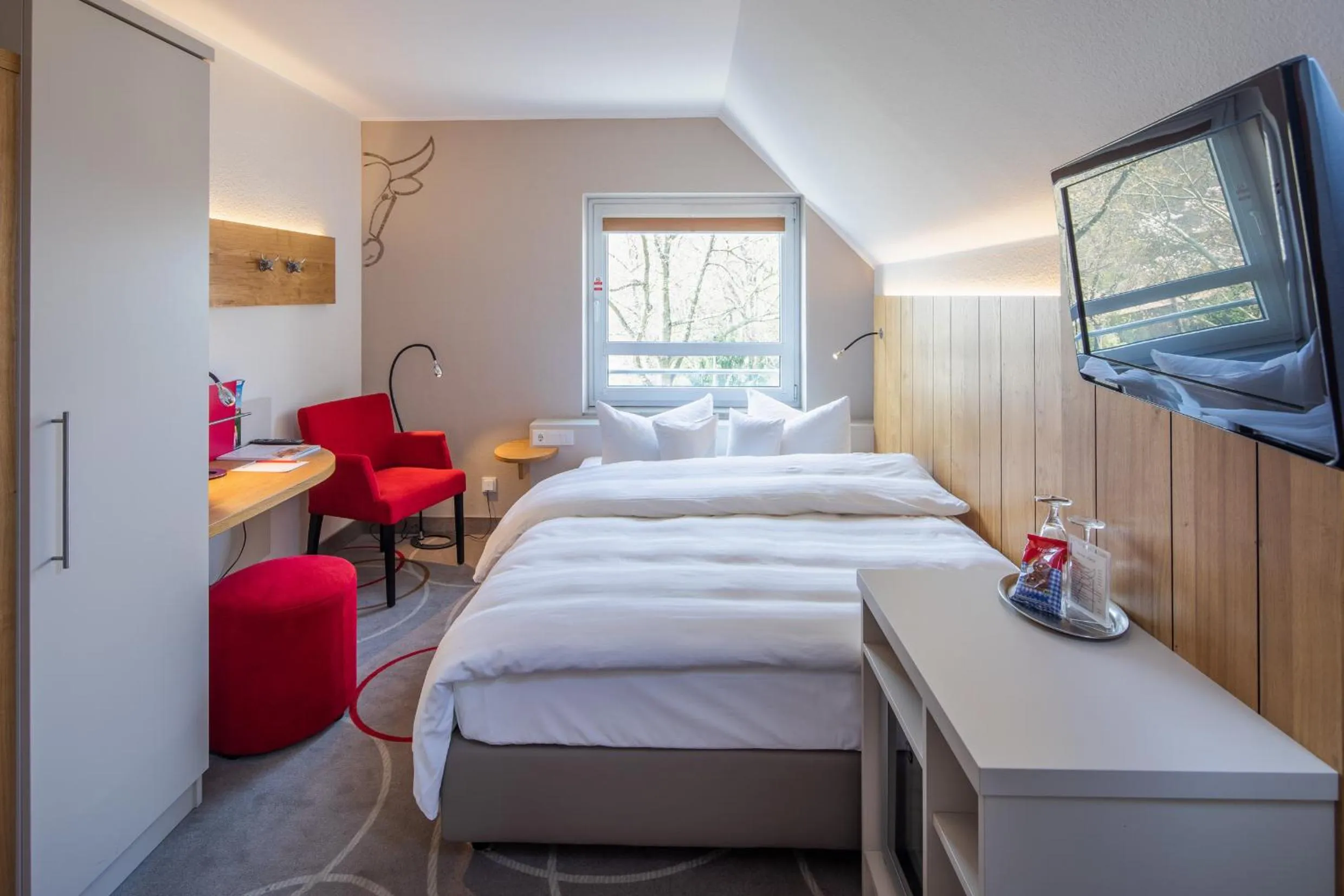 Bed in Hotel Zum Goldenen Ochsen am Schlossgarten