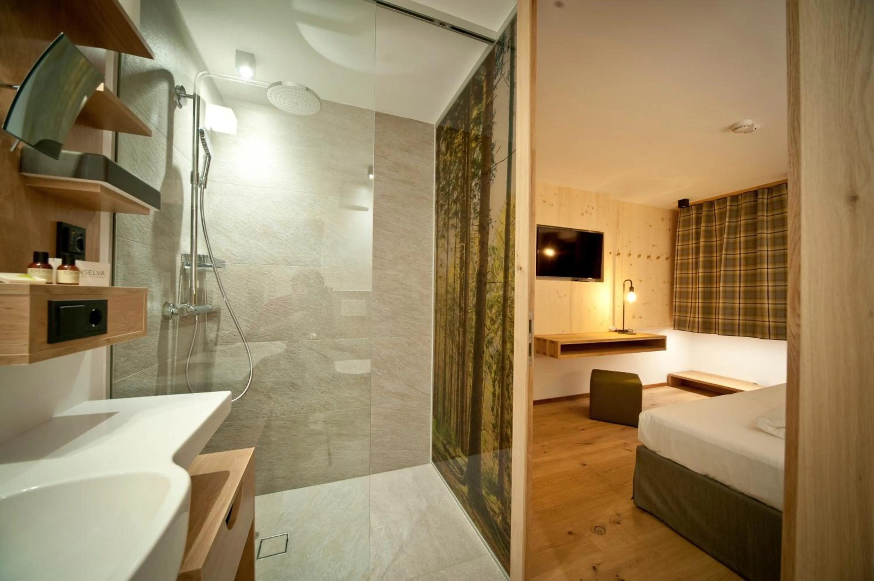 Bathroom, Bed in Mountain Design Hotel Eden Selva