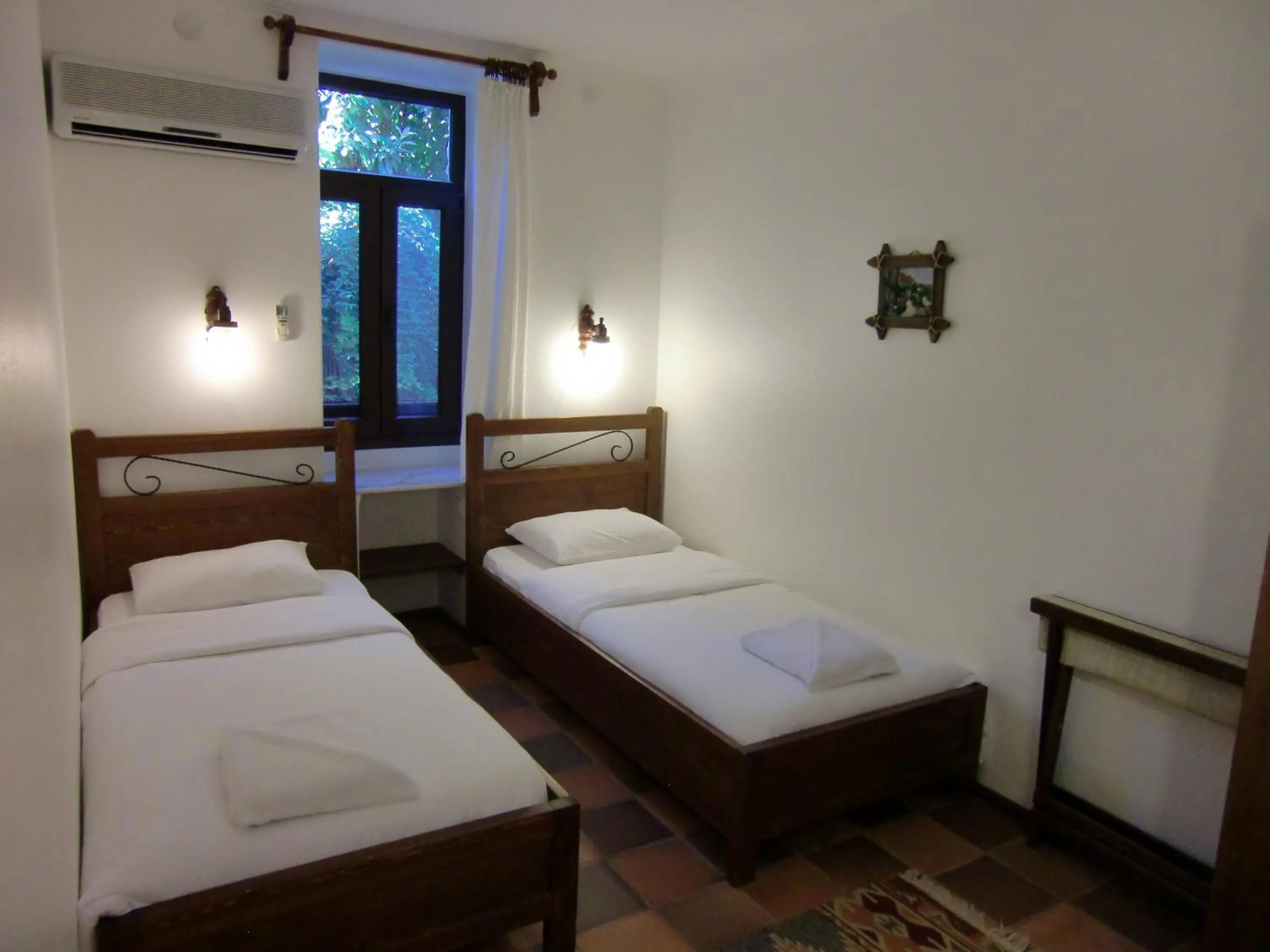 Bed in Hotel Happy Caretta