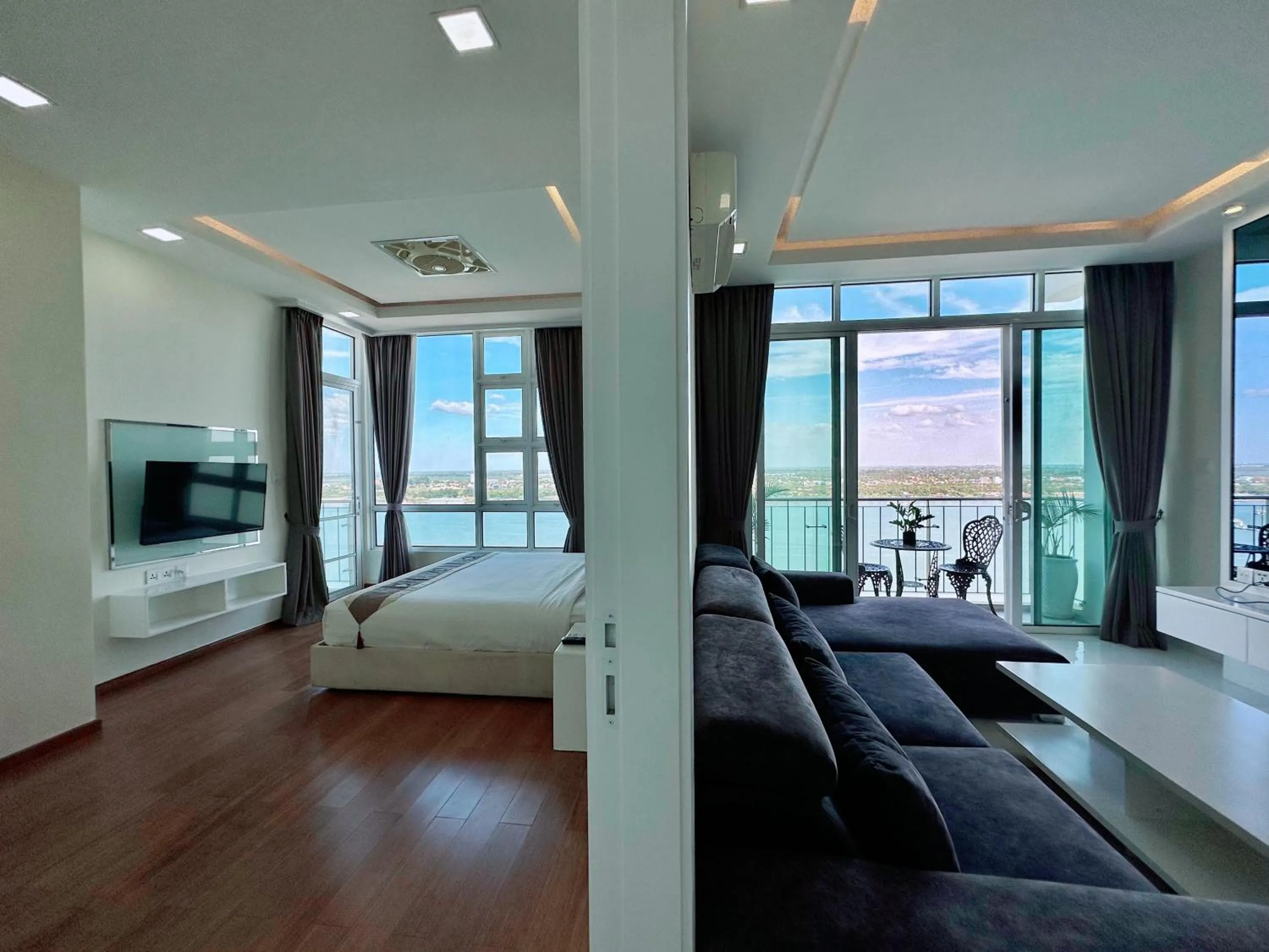 Living room, Bed in Infinity 28 Hotel and Residence