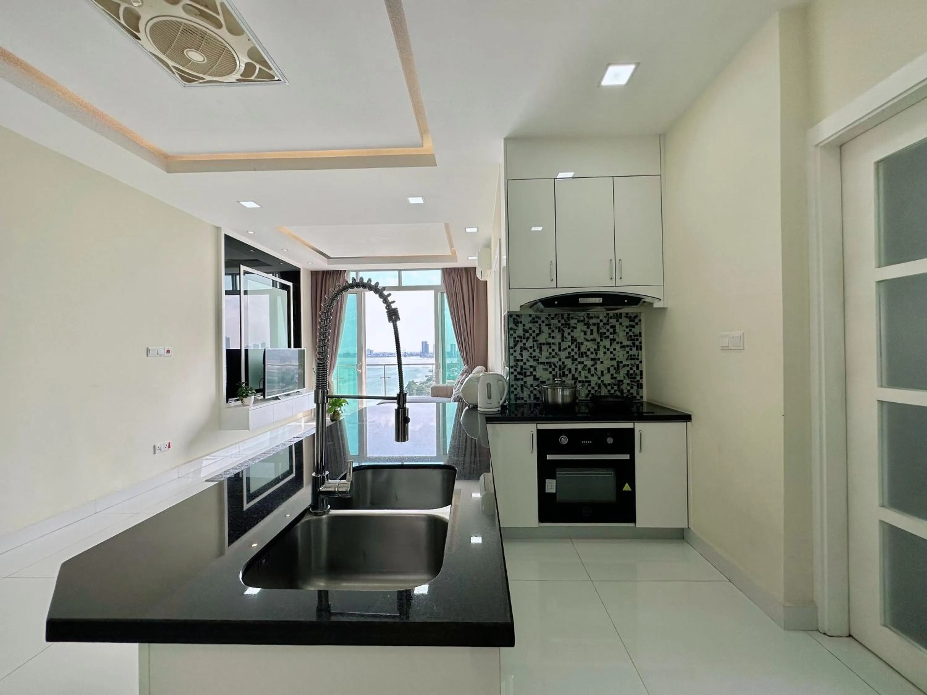 Kitchen or kitchenette in Infinity 28 Hotel and Residence