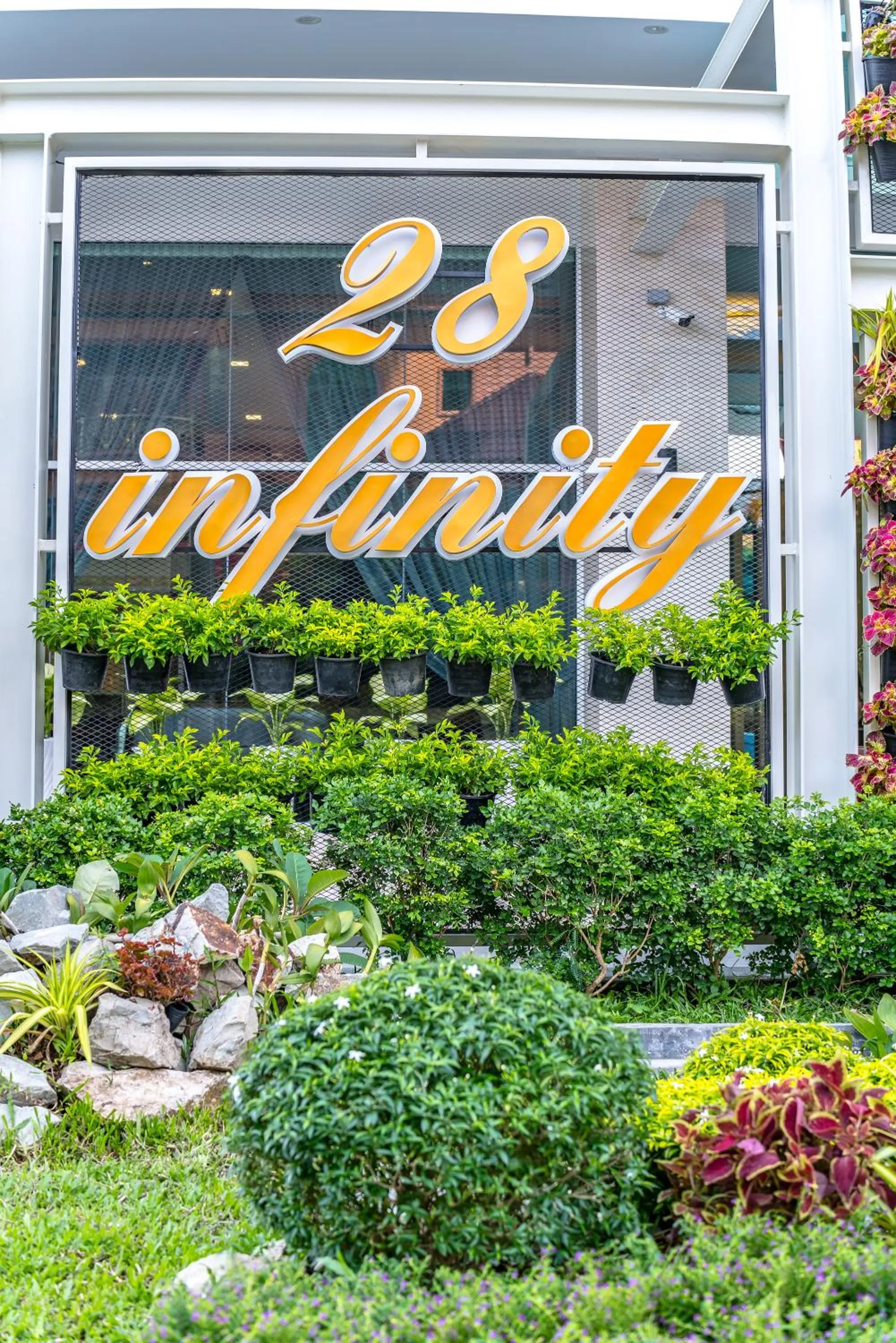 Property logo or sign in Infinity 28 Hotel and Residence